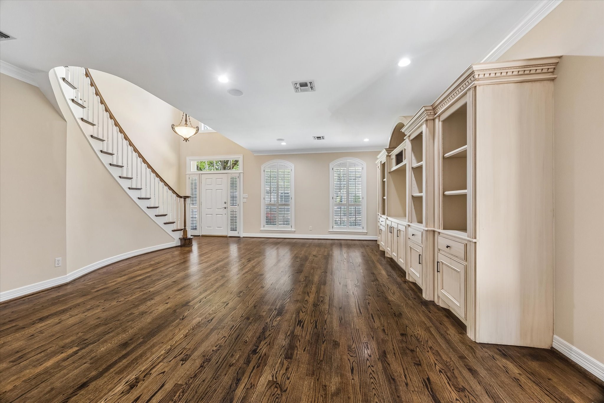 Family room with built-in cabinetry.