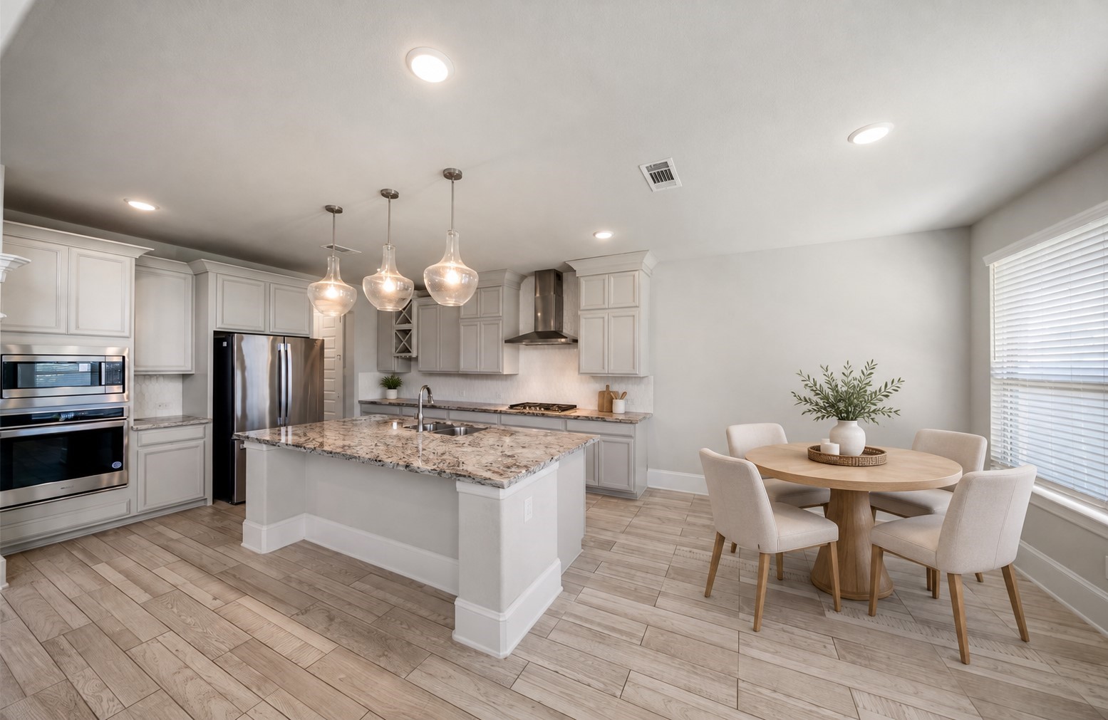 This kitchen is open to the living room and offers a breakfast bar and breakfast room. This kitchen is open to the living room and offers a breakfast bar and breakfast room.