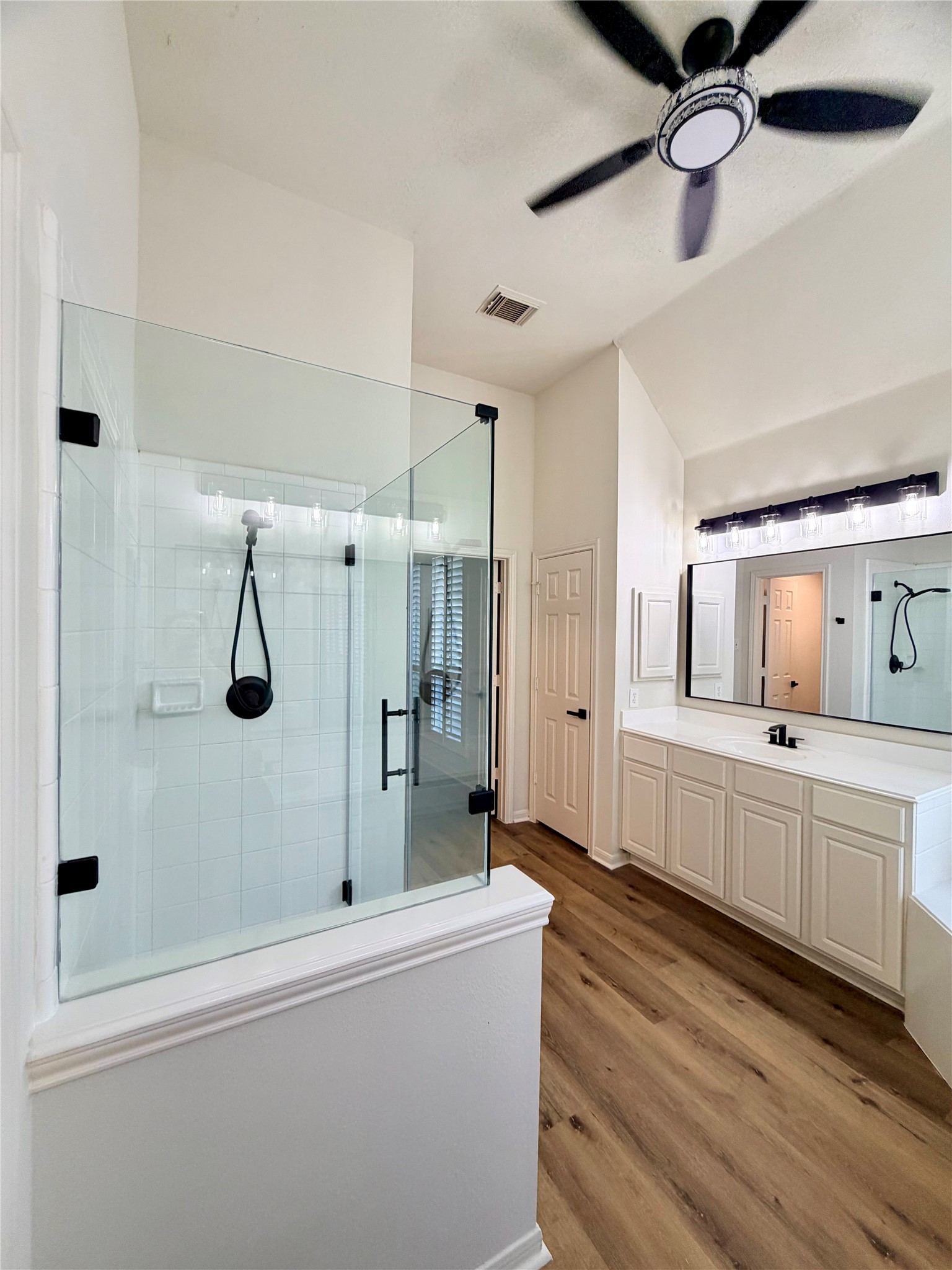Other view of Primary bathroom.  All new fixtures, faucets, hardware & mirrors.  This bathroom has a true linen closet & separate vanities (each w/ medicine cabinets
