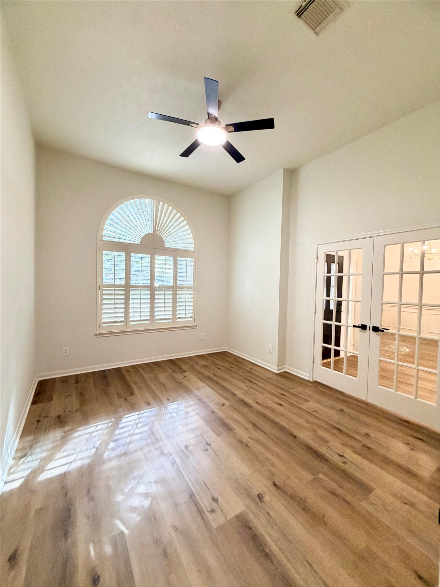 Study/office w/ French doors and a walk-in closet.  This room could be a 4th bedroom in the home.