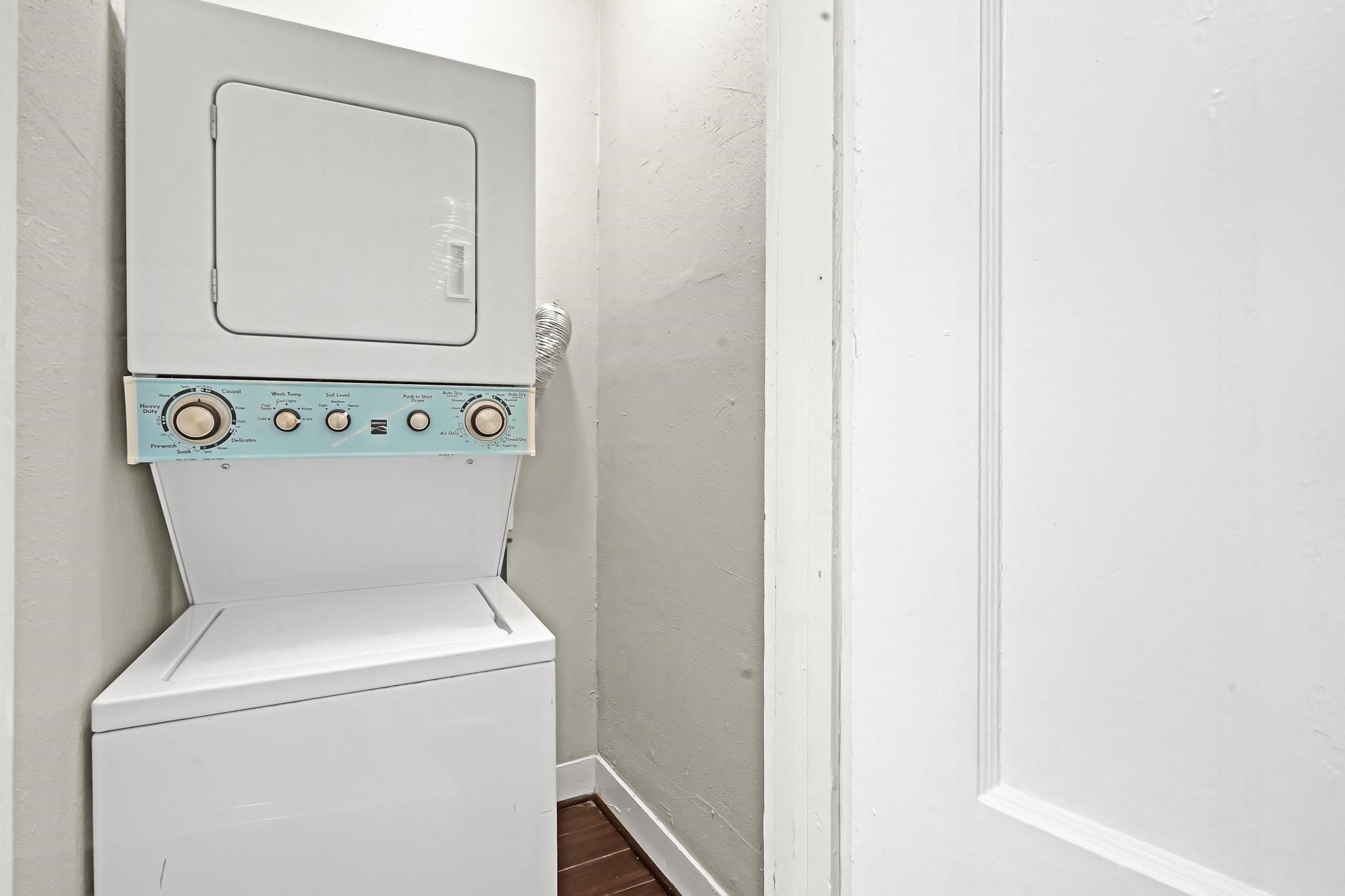 Stacked washer and dryer included in the unit also!