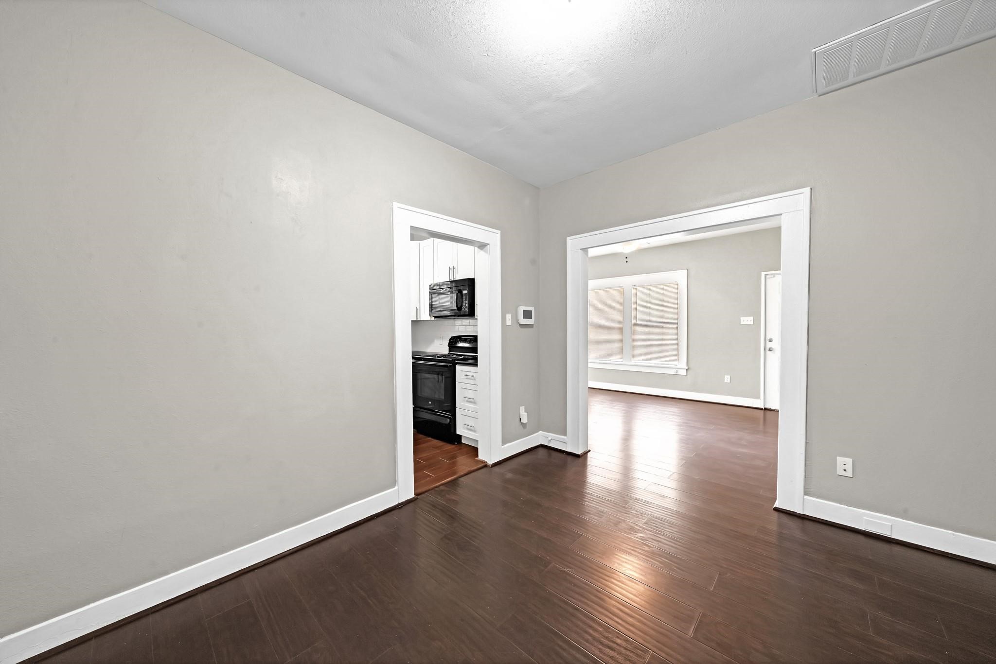 Versatile space perfect for a dining area or home office. Versatile space perfect for a dining area or home office.