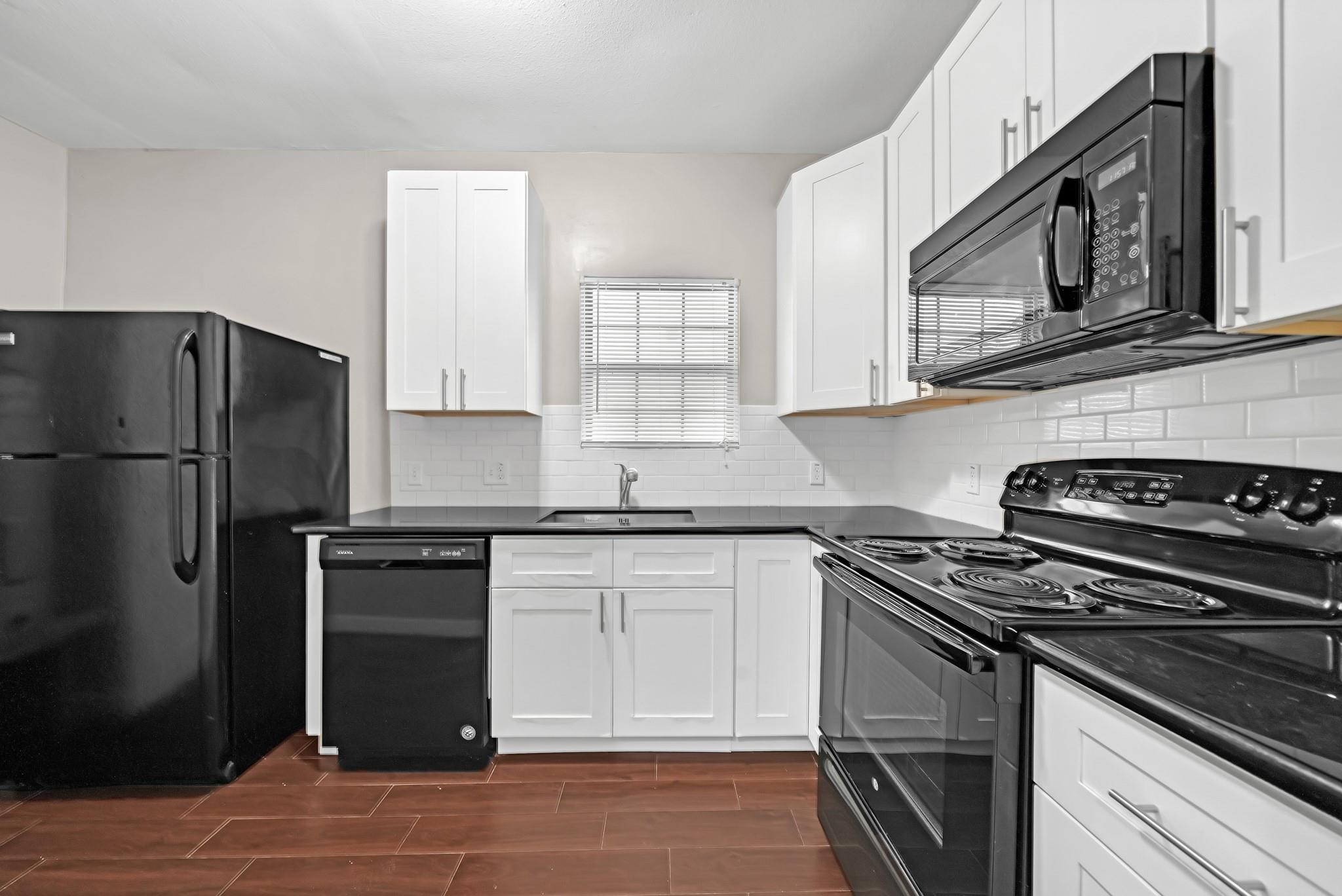 Kitchen offers plenty of cabinet storage and countertop space. Refrigerator included. Kitchen offers plenty of cabinet storage and countertop space. Refrigerator included.