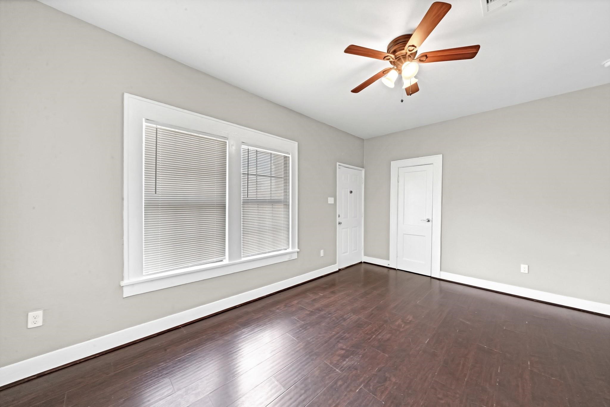 Plenty of natural light fills the living room through the large front window, creating a bright and inviting space. Plenty of natural light fills the living room through the large front window, creating a bright and inviting space.