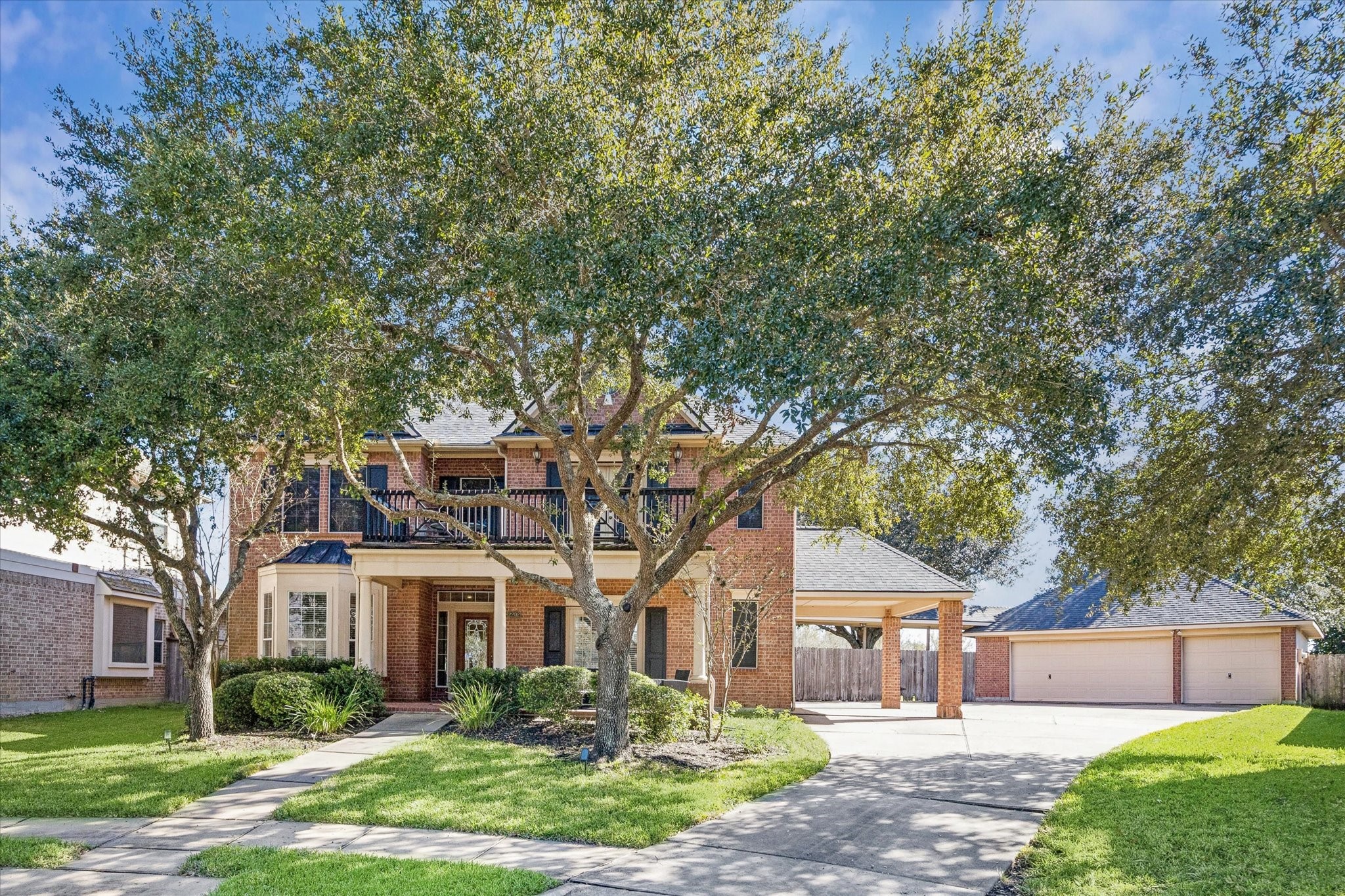 CLASSIC BRICK ELEVATION WITH MATURE TREES, COVERED FRONT PORCH, AND A GRAND PRESENCE ON A QUIET CUL-DE-SAC STREET. CLASSIC BRICK ELEVATION WITH MATURE TREES, COVERED FRONT PORCH, AND A GRAND PRESENCE ON A QUIET CUL-DE-SAC STREET.