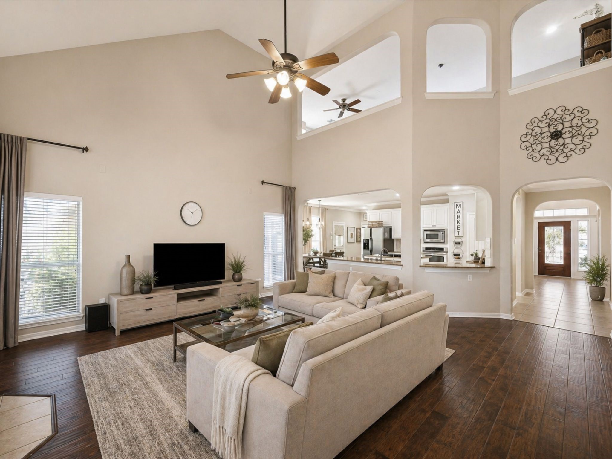OPEN-CONCEPT DESIGN WITH CLEAR SIGHTLINES FROM THE LIVING ROOM INTO THE KITCHEN AND ENTRY. **Virtually Staged.