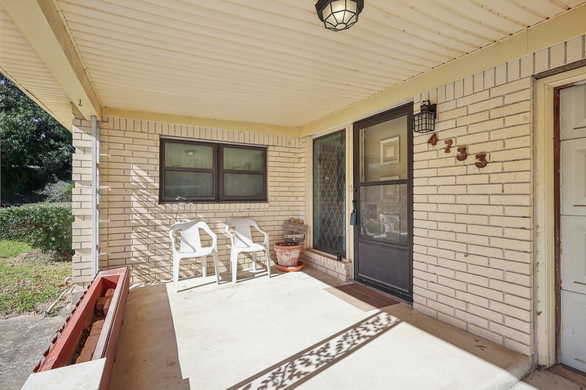 Spacious front porch to enjoy your morning coffee on...