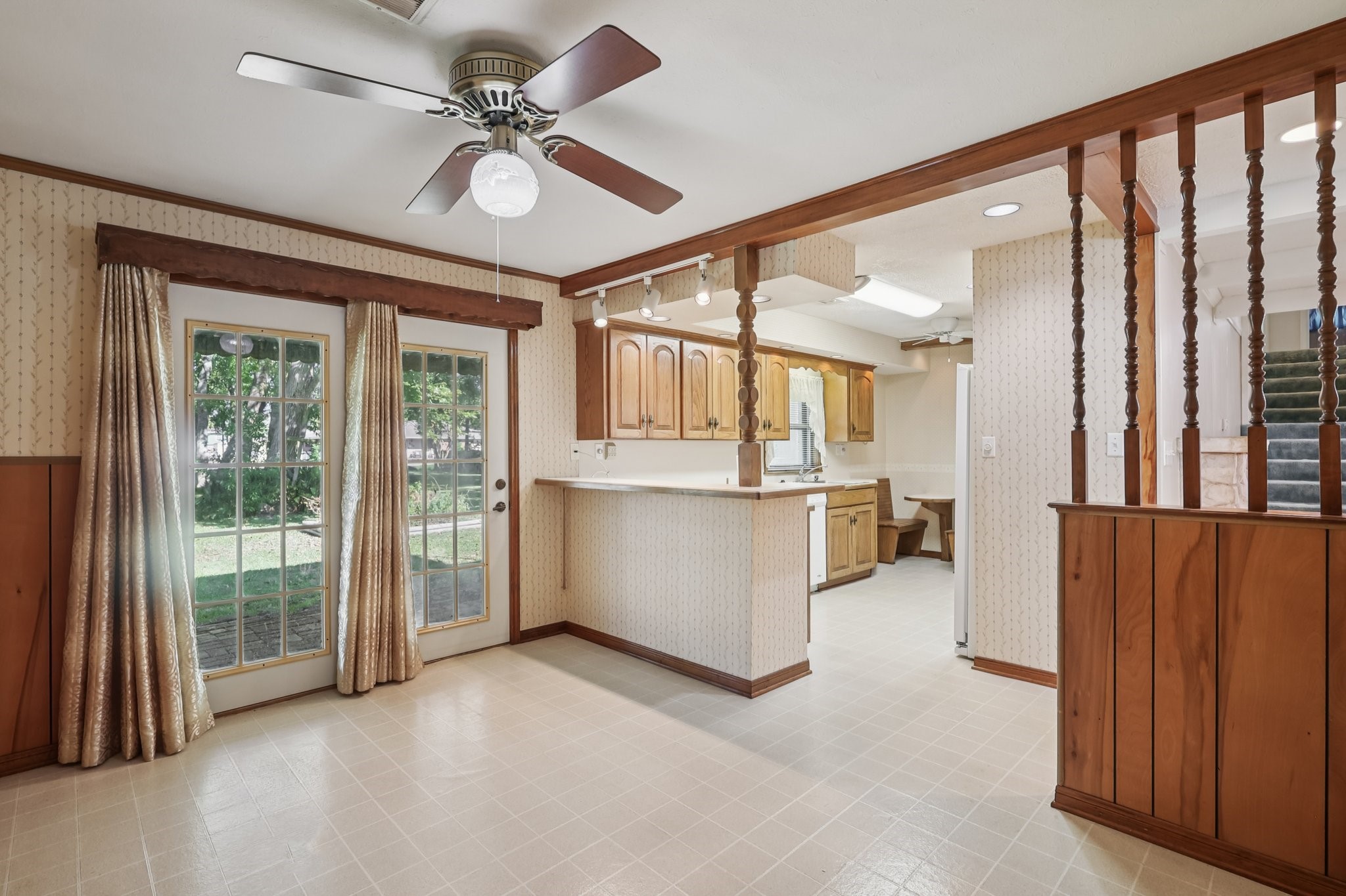 Great breakfast area just off the kitchen with french doors leading to the huge back yard.