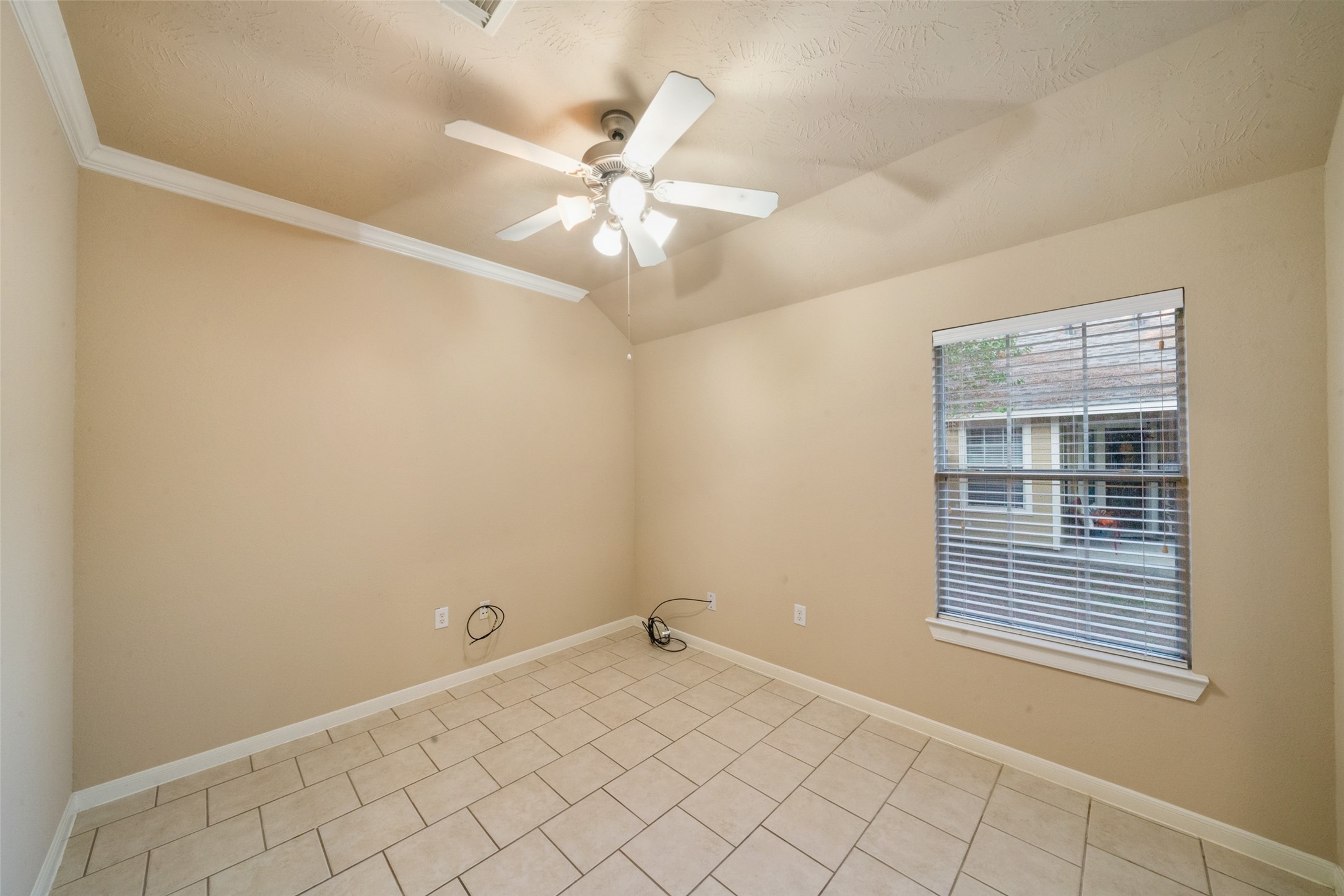 Flex space at the front of the home is ideal for an office, sitting area or hobby room.