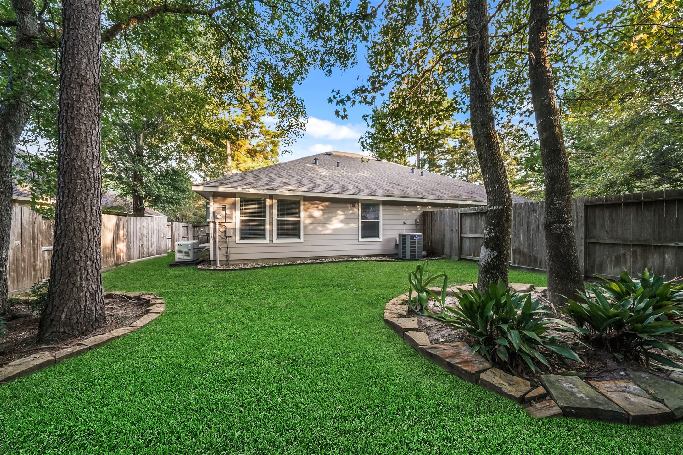 A view of from the back yard. Mature trees and landscape are easy to maintain. 
Front yards are maintained by the HOA!