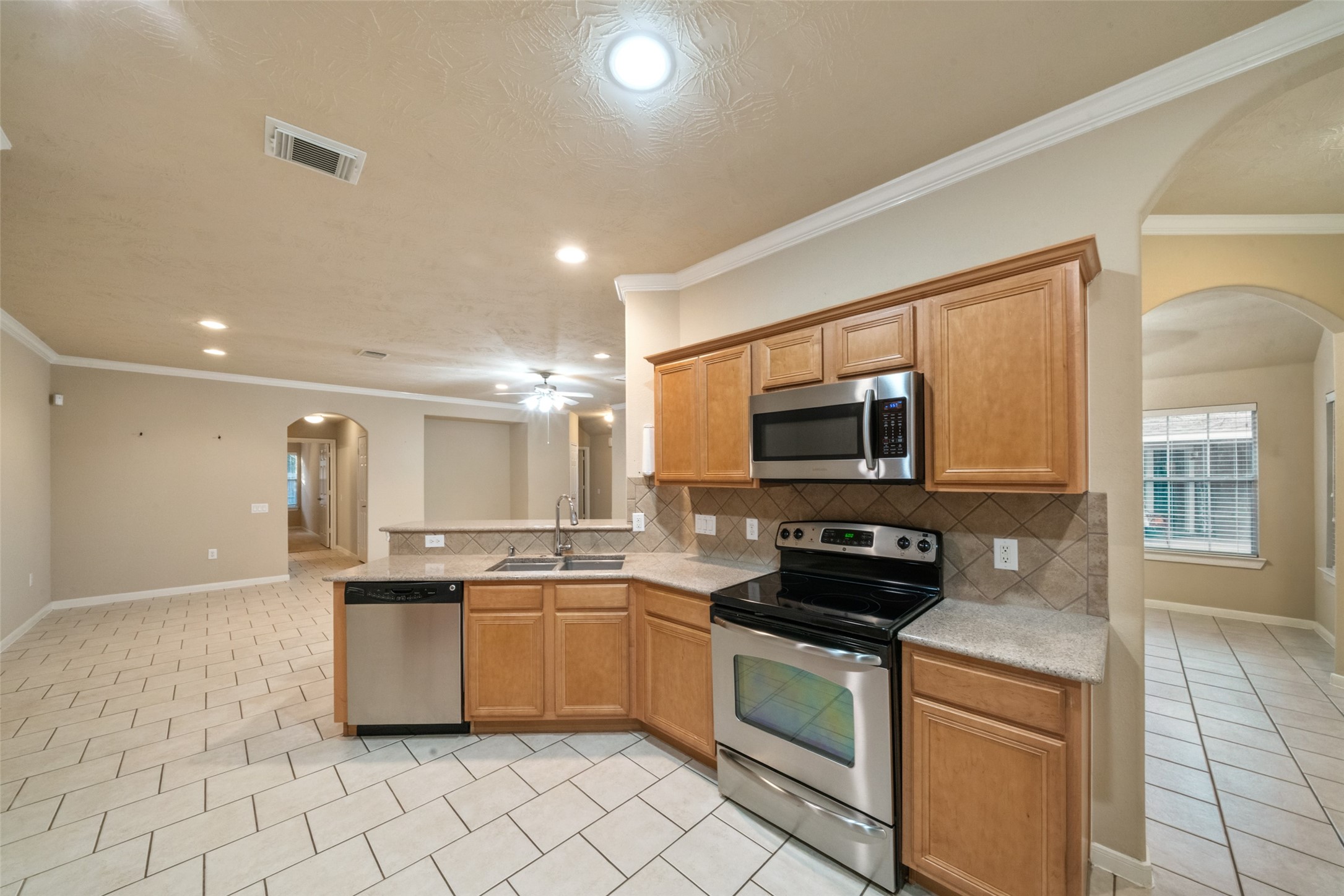 Kitchen space is open to the rest of the home, perfect for entertaining or enjoying your favorite show while you prepare a quite meal.