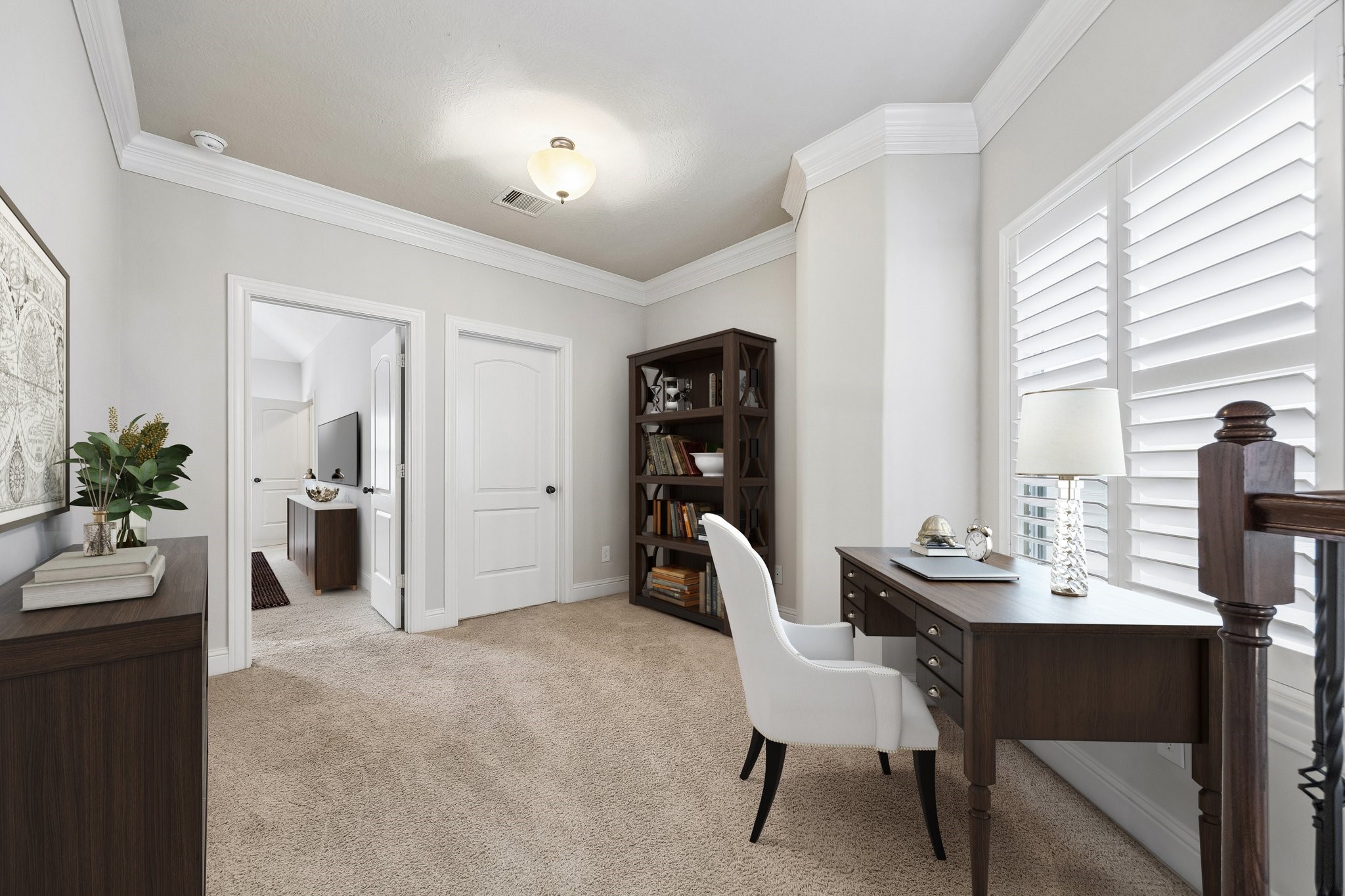 Versatile upstairs flex space ideal for office, lounge, or study use.