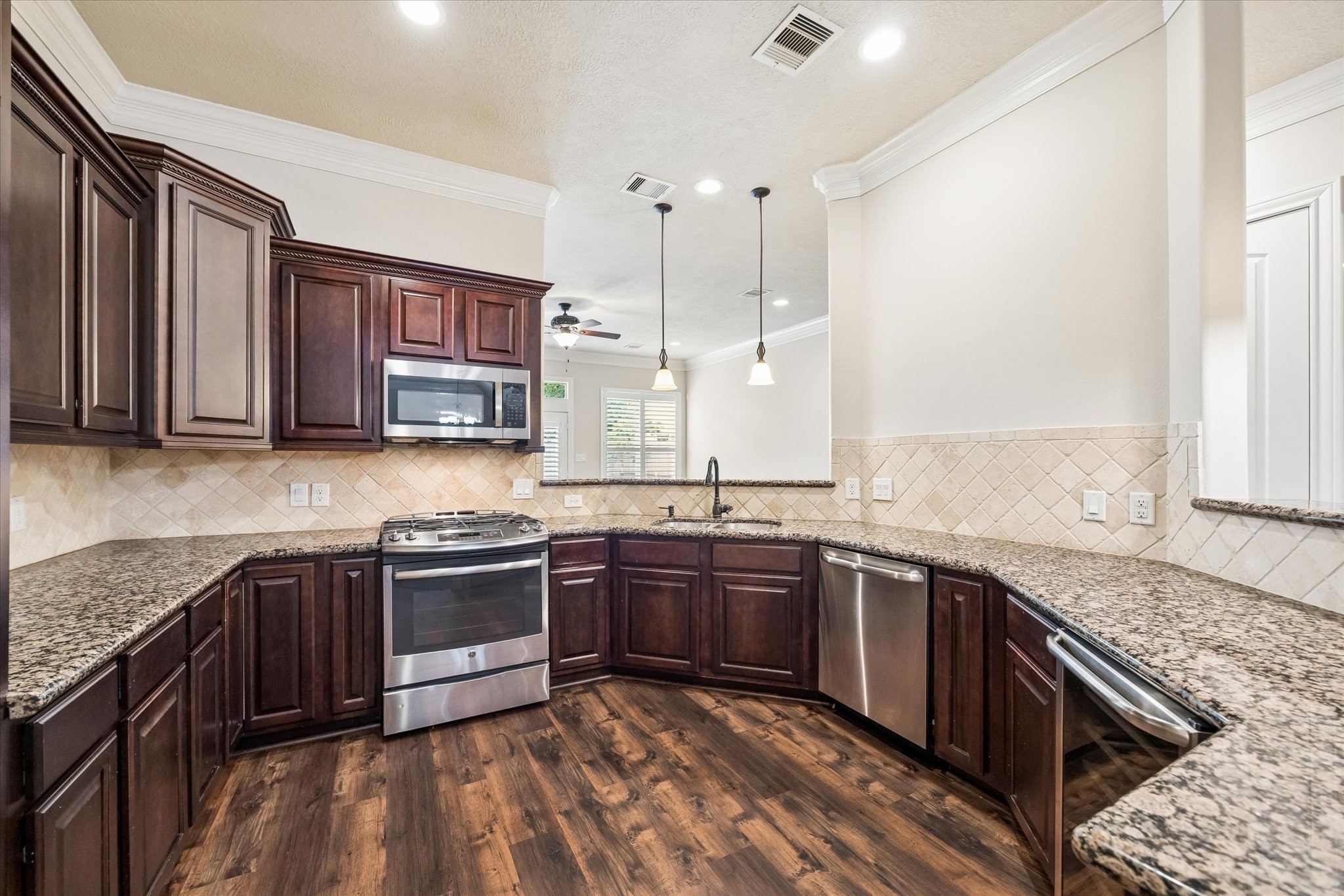 Spacious kitchen designed for entertaining with abundant counter space.