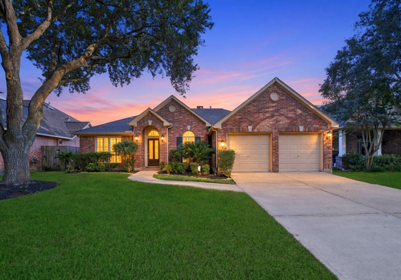 The view of front elevation W/NEW Roof, mature landscpaing. The view of front elevation W/NEW Roof, mature landscpaing.