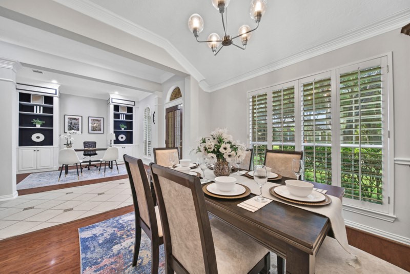 The other view of formal dining W/Plantation shutters. The other view of formal dining W/Plantation shutters.