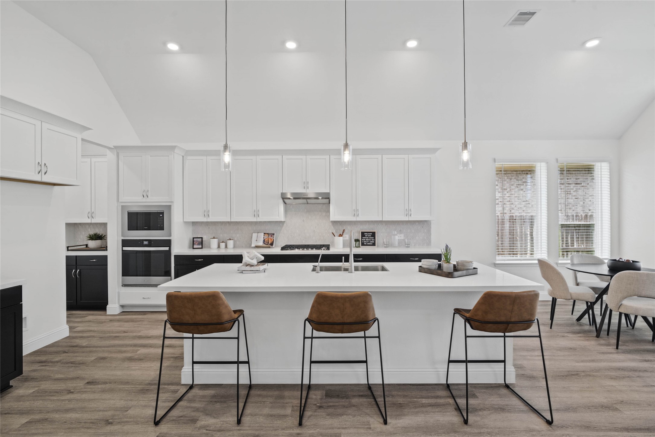 Overview perspective of this spacious modern kitchen.