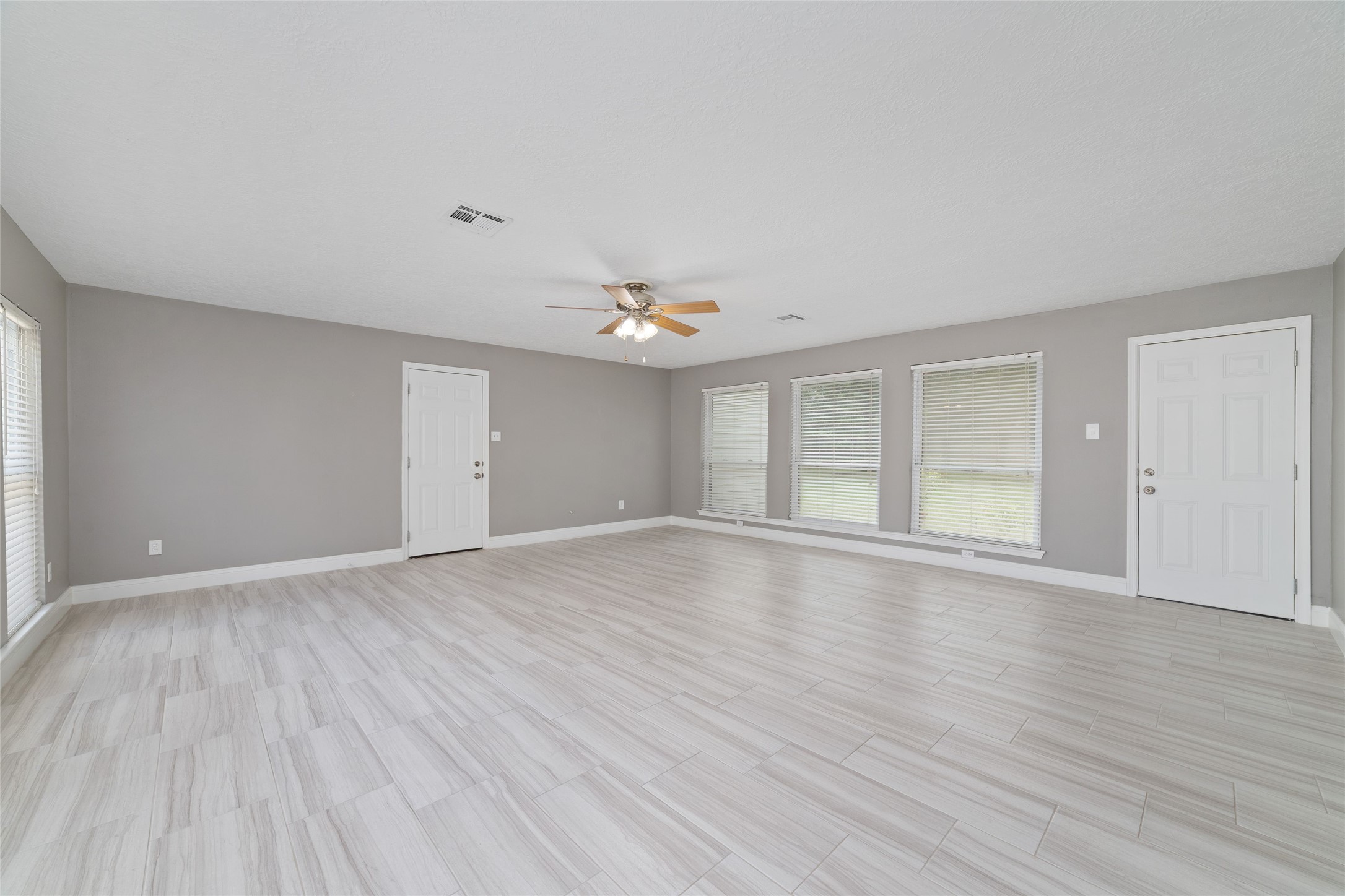 Family room shown unstaged.