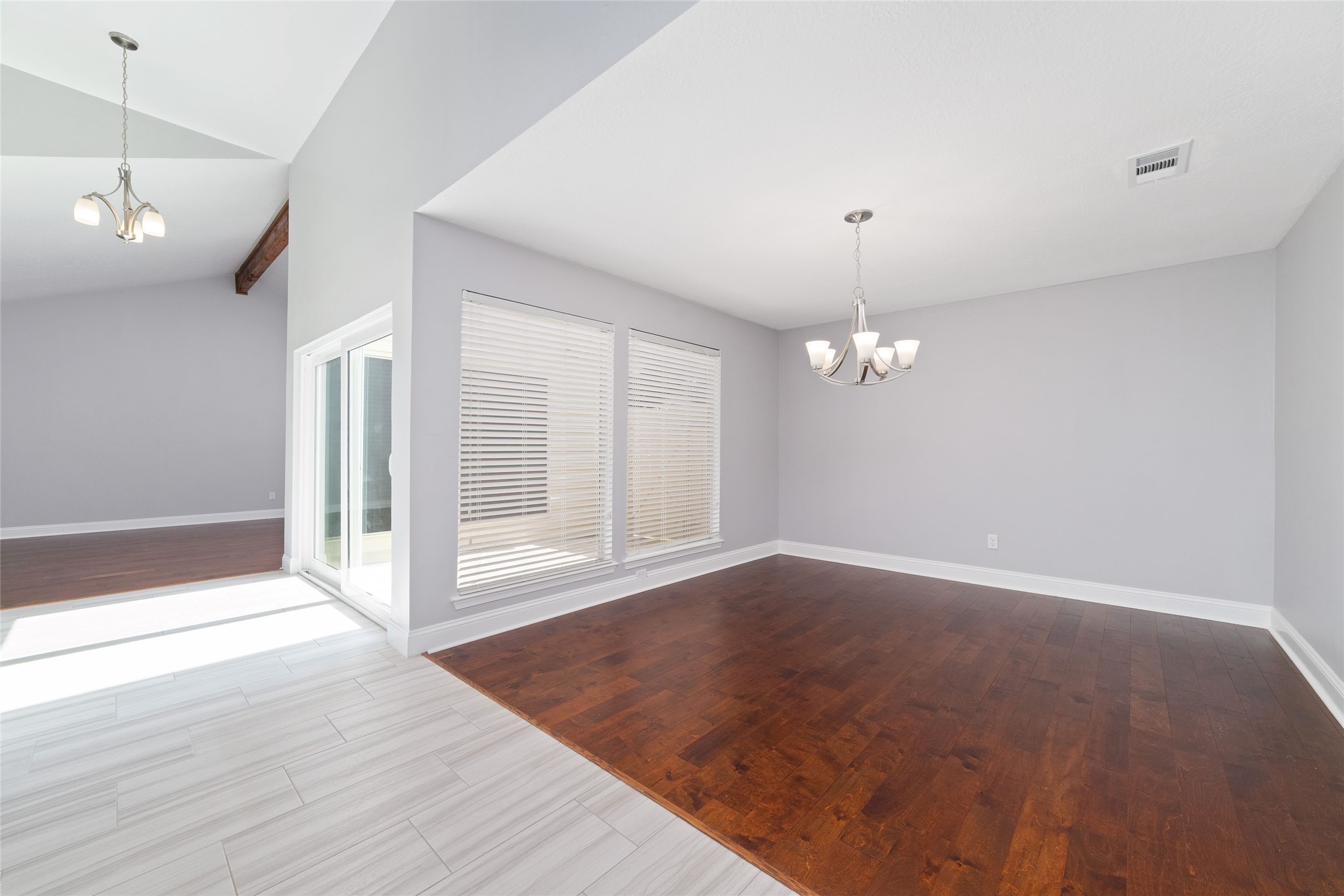 Designed with flexibility in mind! This light-filled space near the front entry can serve as a traditional Dining Room, dedicated Home Office, library, or creative retreat. Oversized windows overlooking the private courtyard provide an inspiring backdrop for whatever suits your lifestyle.