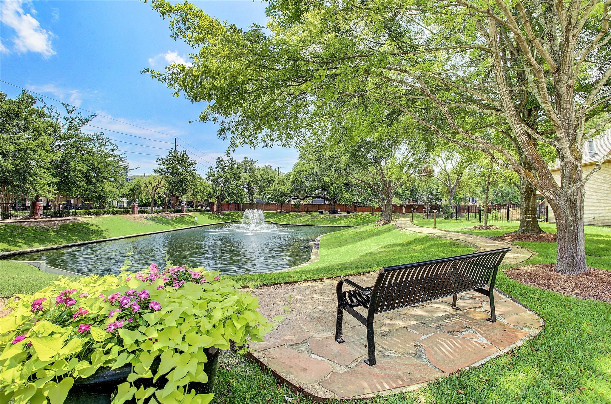 A relaxing view of the lake and fountain as you enter the community.