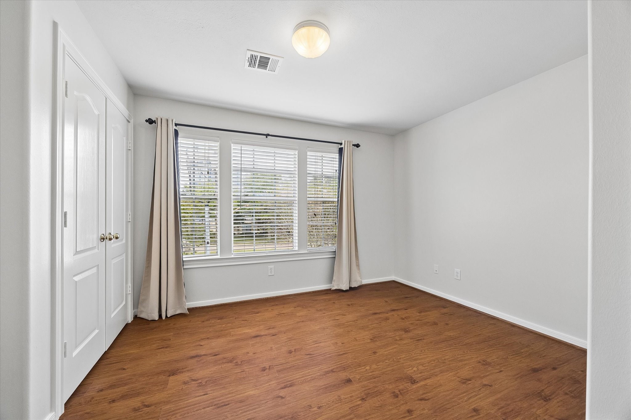 Upstairs right bedroom.