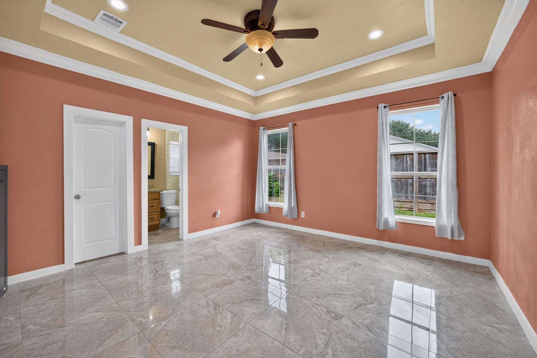Primary Bedroom with Tray Ceiling Primary Bedroom with Tray Ceiling