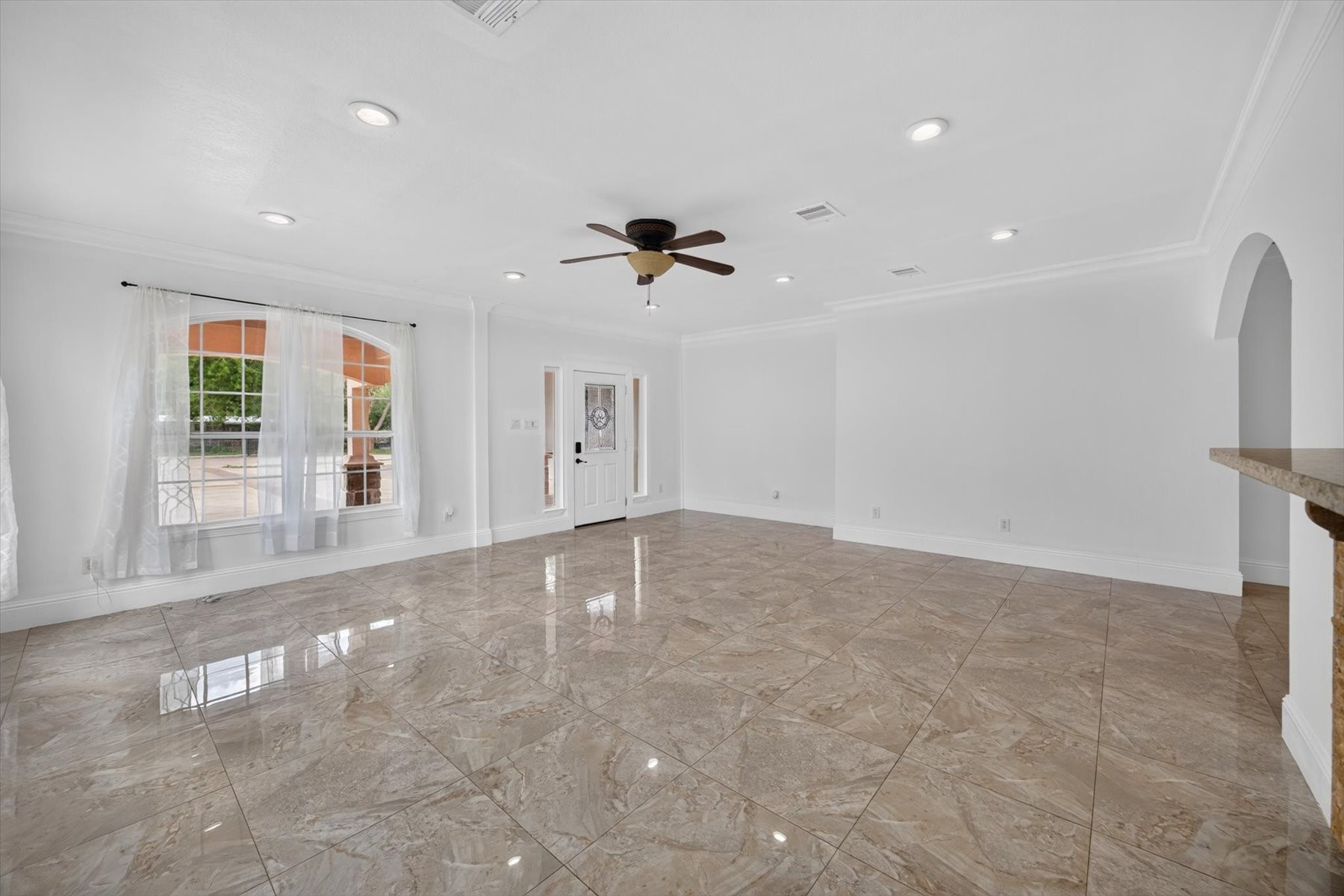Living Room with Tile Flooring & Recessed Lighting Living Room with Tile Flooring & Recessed Lighting