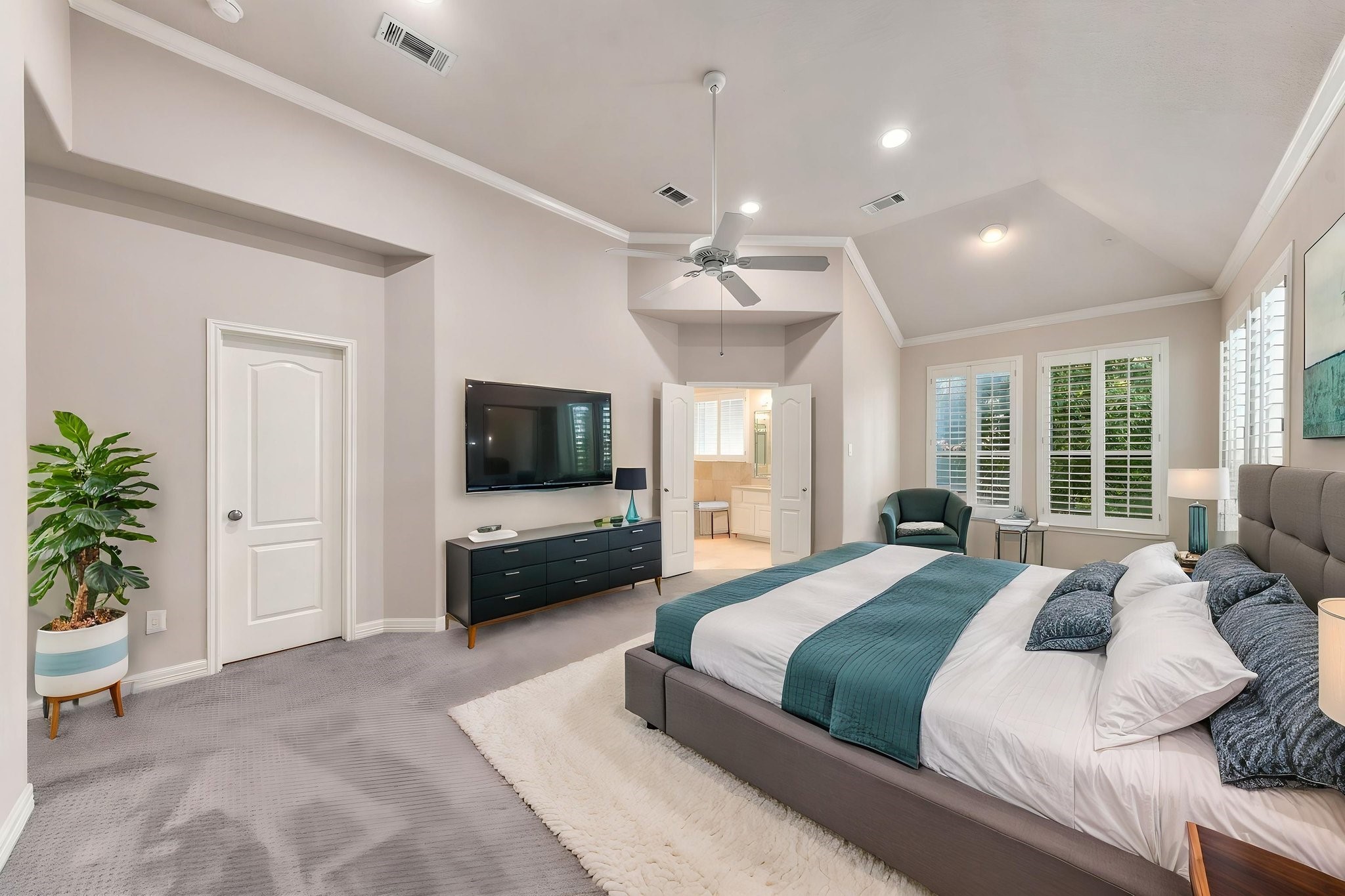 The inviting primary suite features a vaulted ceiling, plantation shutters, beautiful natural light & an en-suite bath. All four bedrooms are located upstairs, with three secondary bedrooms offering flexibility for a home office, study or guest accommodations. Virtually staged.