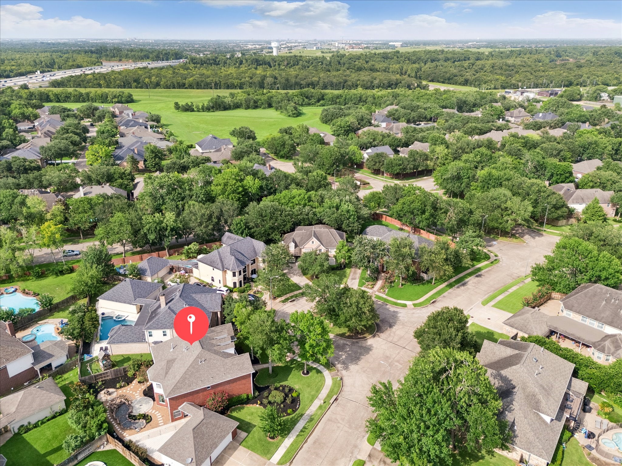 This beautifully positioned home sits on a quiet cul-de-sac surrounded by mature trees, with easy access to nearby green space and major commuter routes.