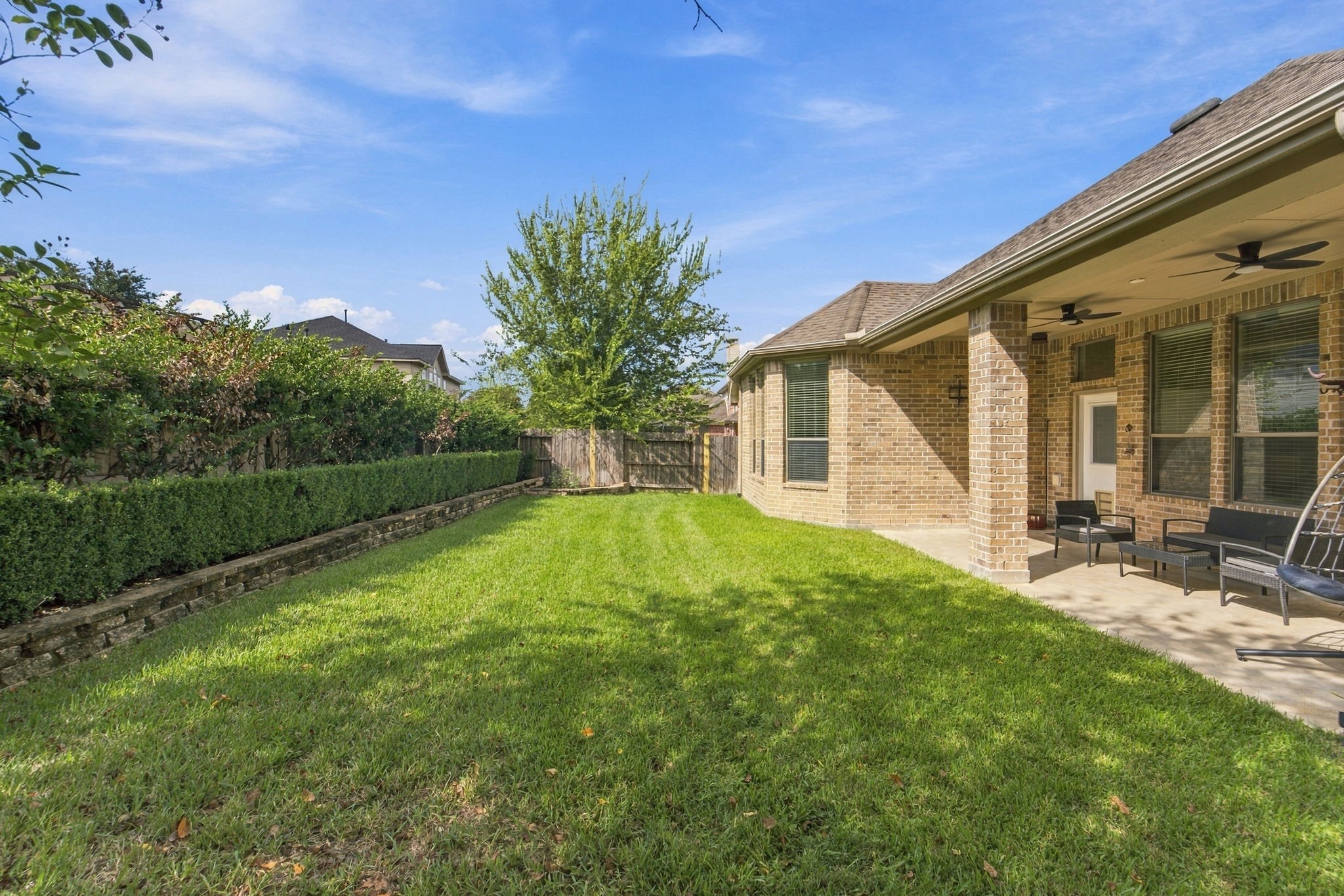 Room to play, garden, or relax in this backyard, with a refreshed back fence for added privacy.
