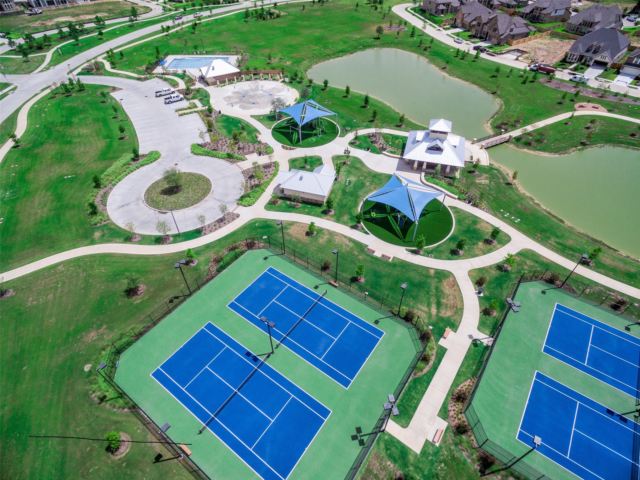 Lakeland Village Park offers a heated lap pool thats open year-round, making it perfect for daily exercise and staying active in any season. Adjacent to the pool is a vibrant spraypark, where kids can splash, play, and cool off in a safe and engaging environmentideal for family fun all year long.