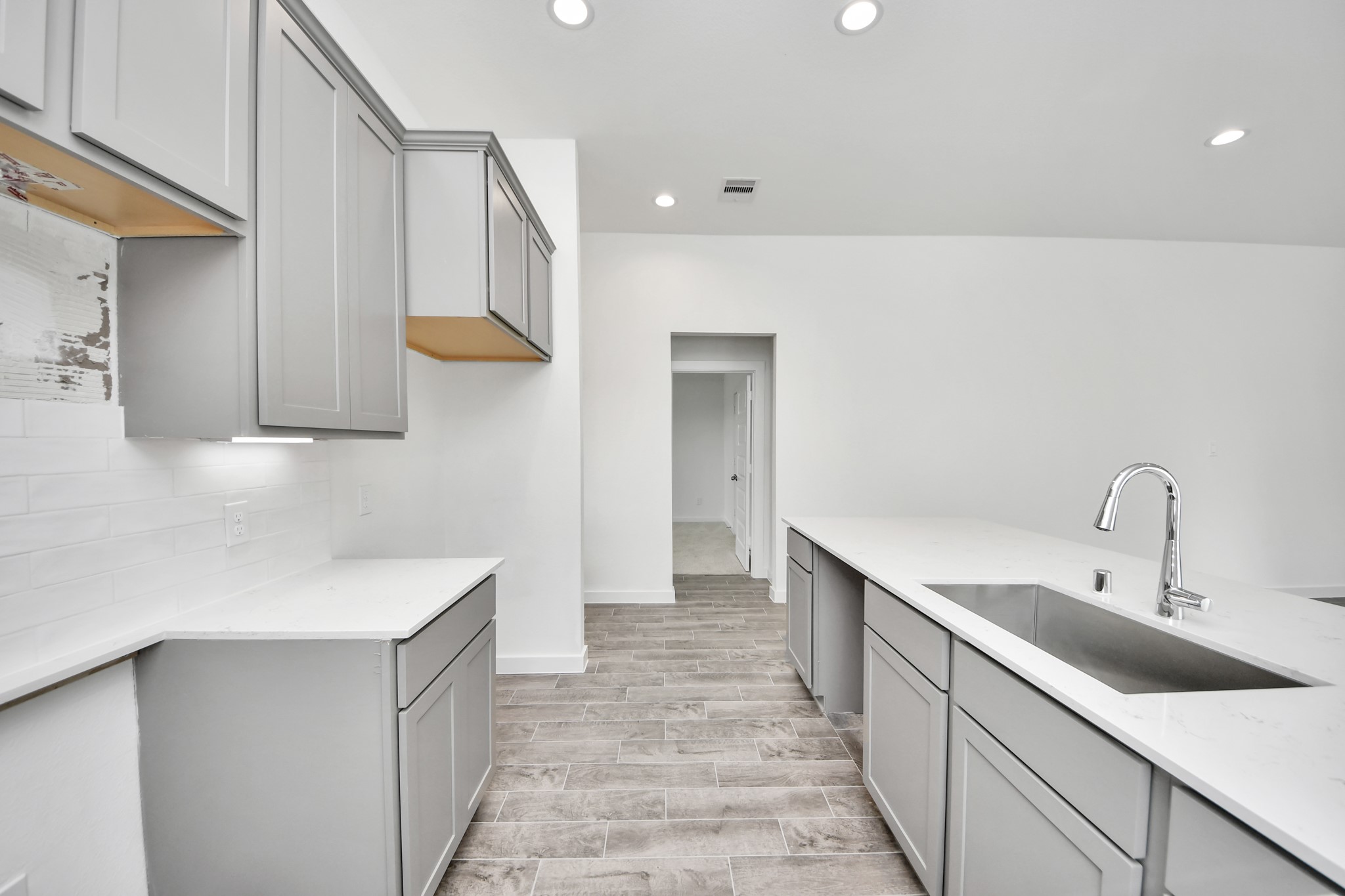 This generously spacious kitchen is a dream realized! Sample photo of completed home with similar floor plan. Actual colors and selections may vary.
