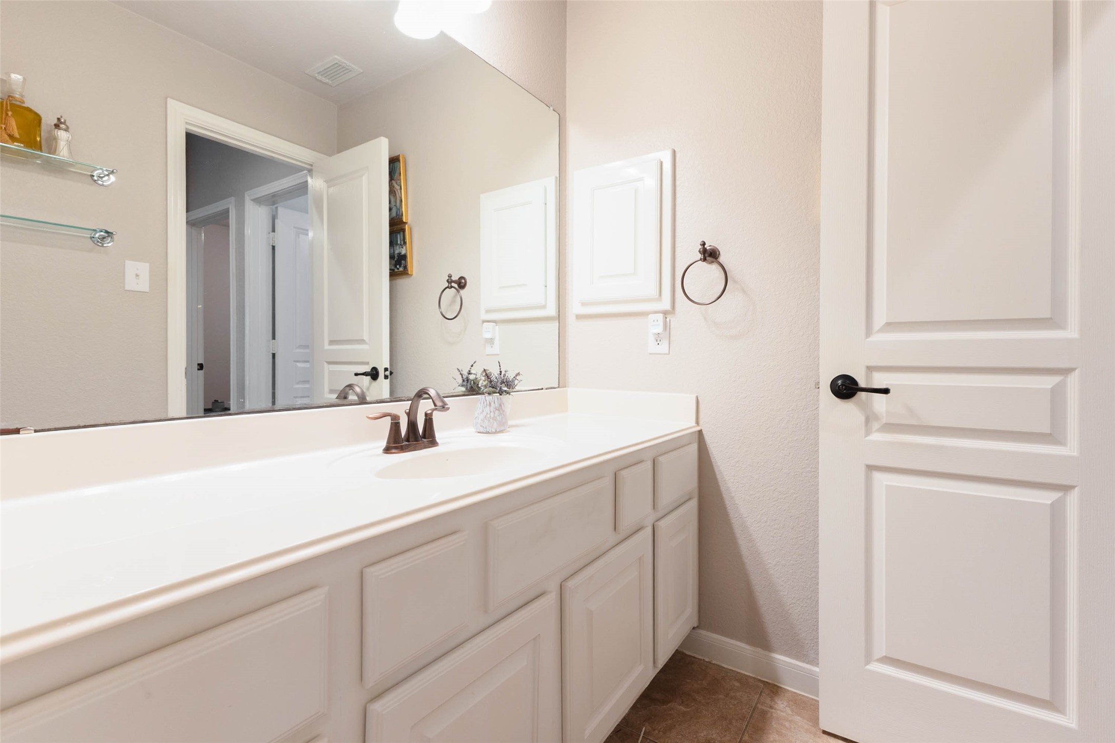 Crisp white cabinetry create a bright, polished space for everyday convenience.