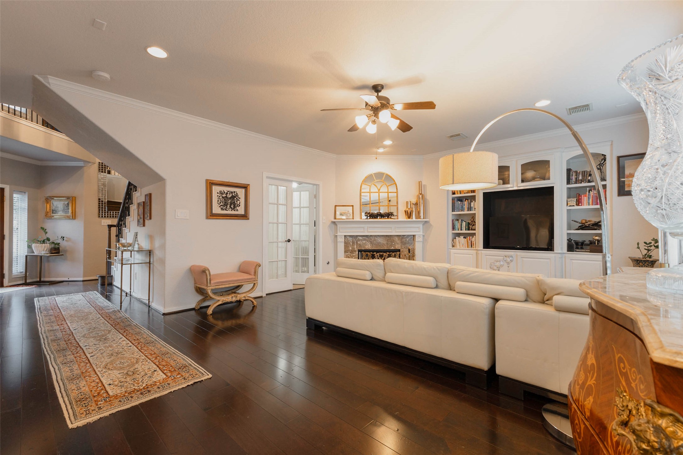 An open, airy layout connects the family room to the surrounding spaces, offering ease of life's daily moments.