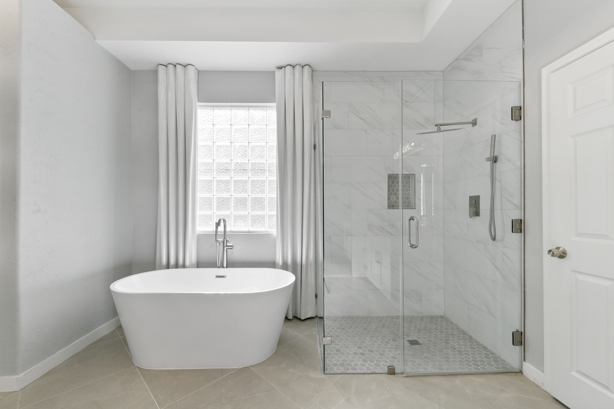 Separate tub and shower.