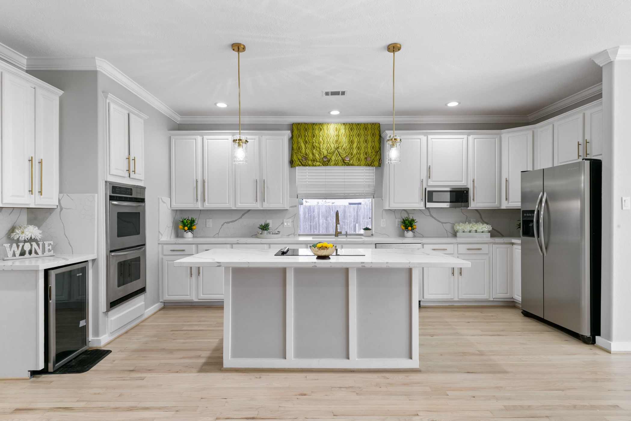 Beautiful renovated kitchen with Quartz countertops.