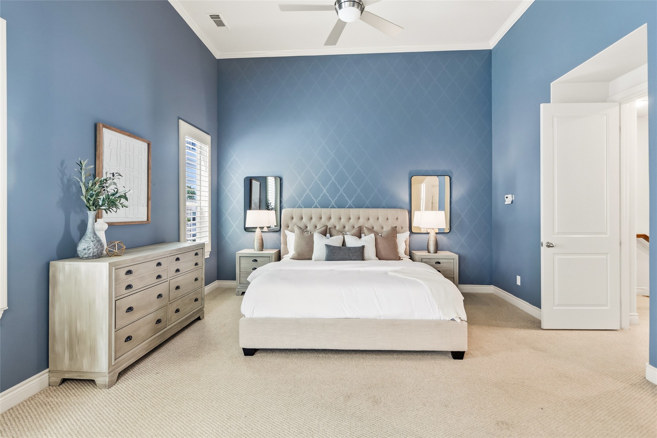 You walk into your bedroom and immediately feel the space open up around you, with high ceilings and a layout that gives everything room to breathe. Its calm, comfortable, and easy to settle into at the end of the day.