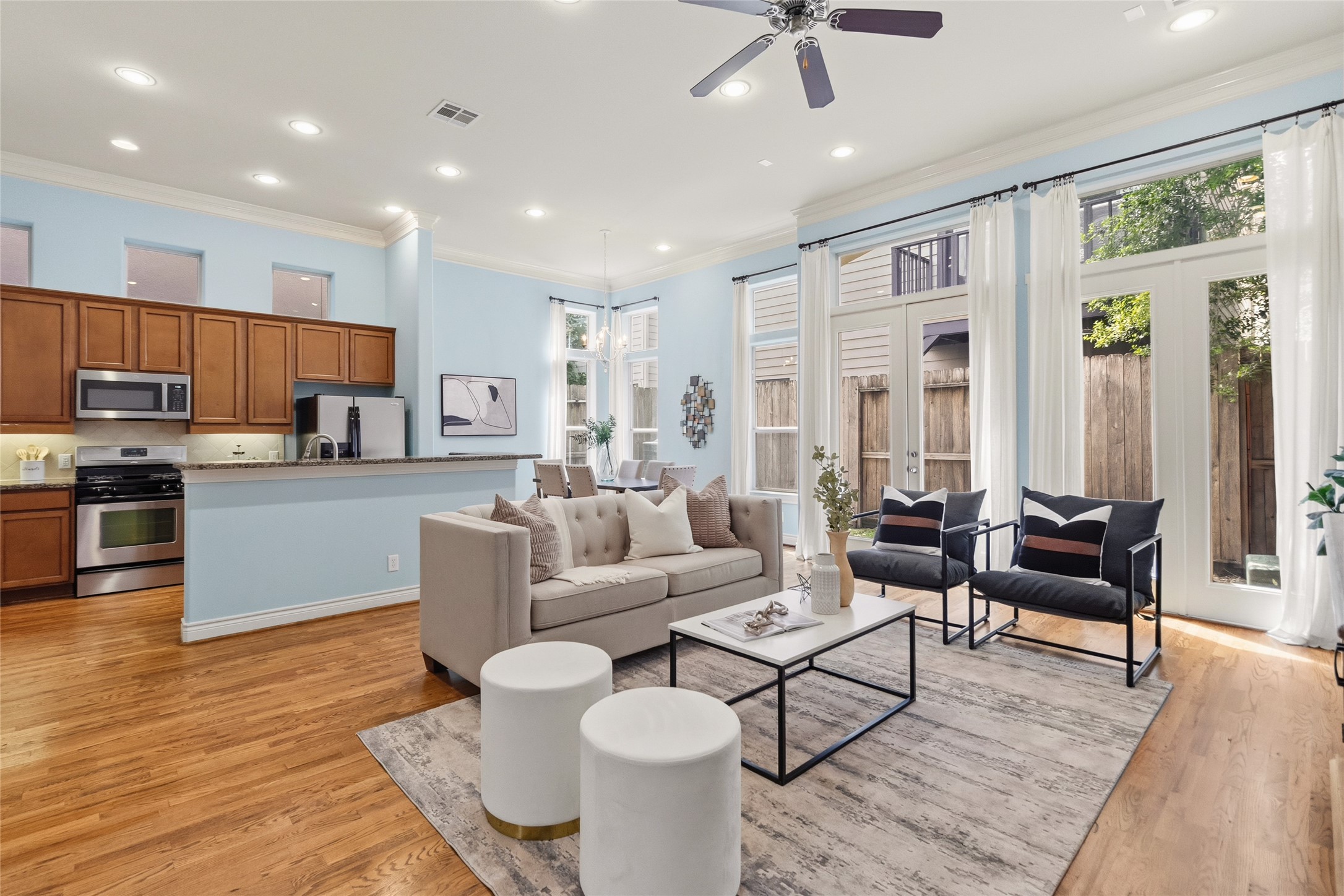 Youre back in the heart of the home where everything connectskitchen, dining, and living all within reach, making it easy to host or just relax. The natural light pouring in keeps the whole space feeling alive.