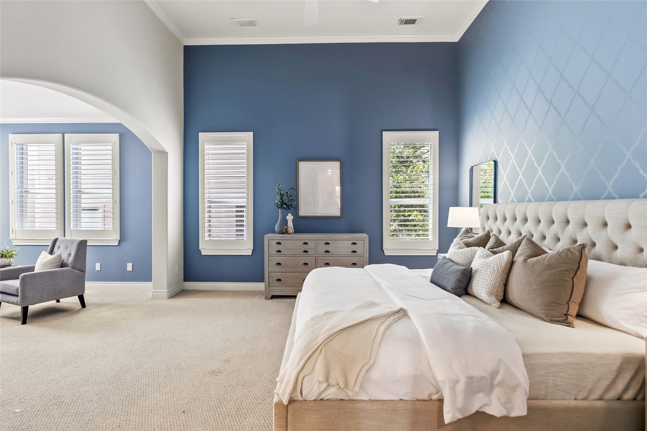 You unwind in your primary suite, where the soft tones, spacious layout, and natural light create a calm, private retreat. Theres more than enough room here to truly relax and reset.