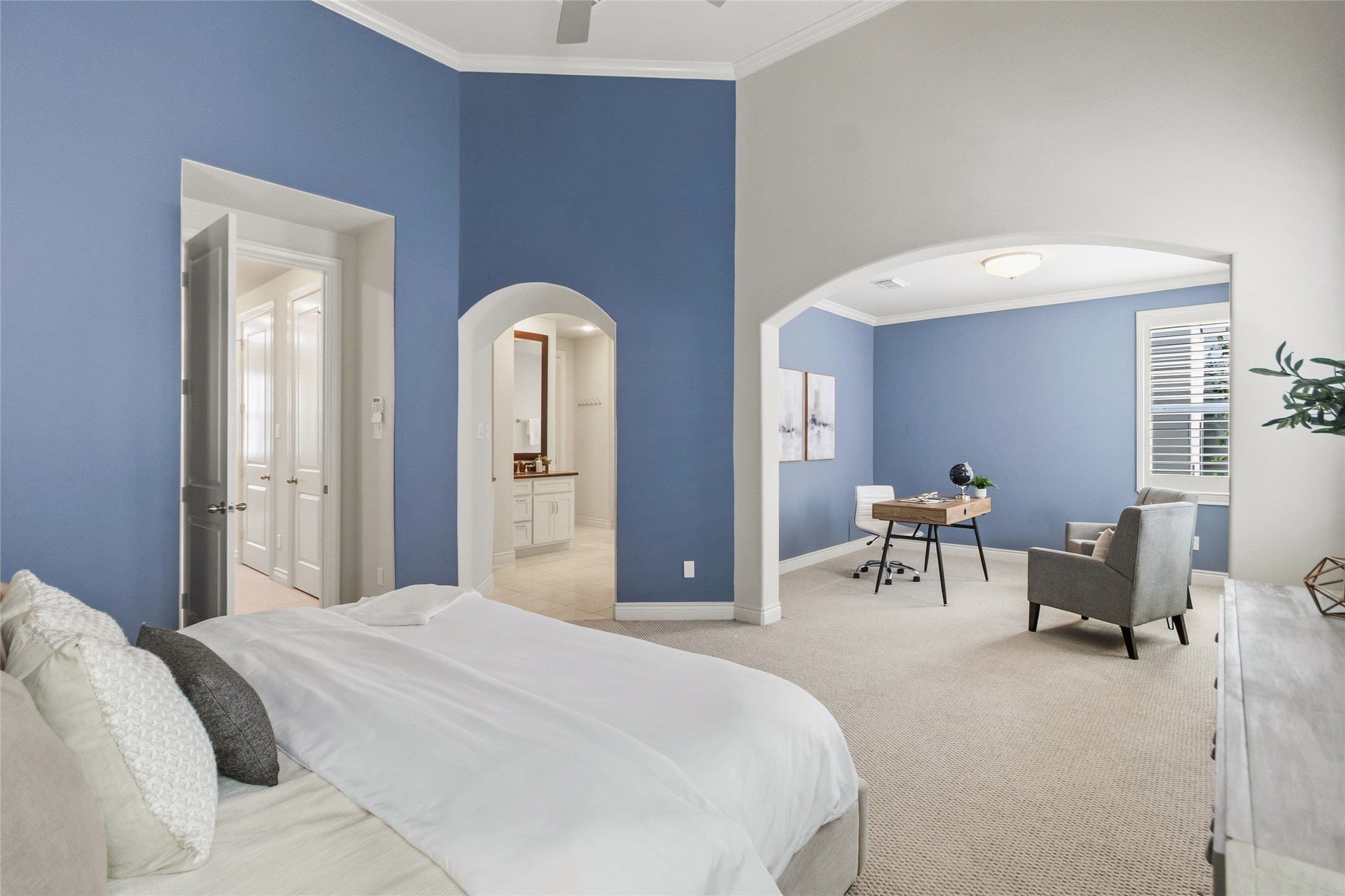You get the best of both worlds herea true bedroom plus an additional sitting or workspace just beyond the archway. Its the kind of setup that adapts to your routine without feeling cramped.
