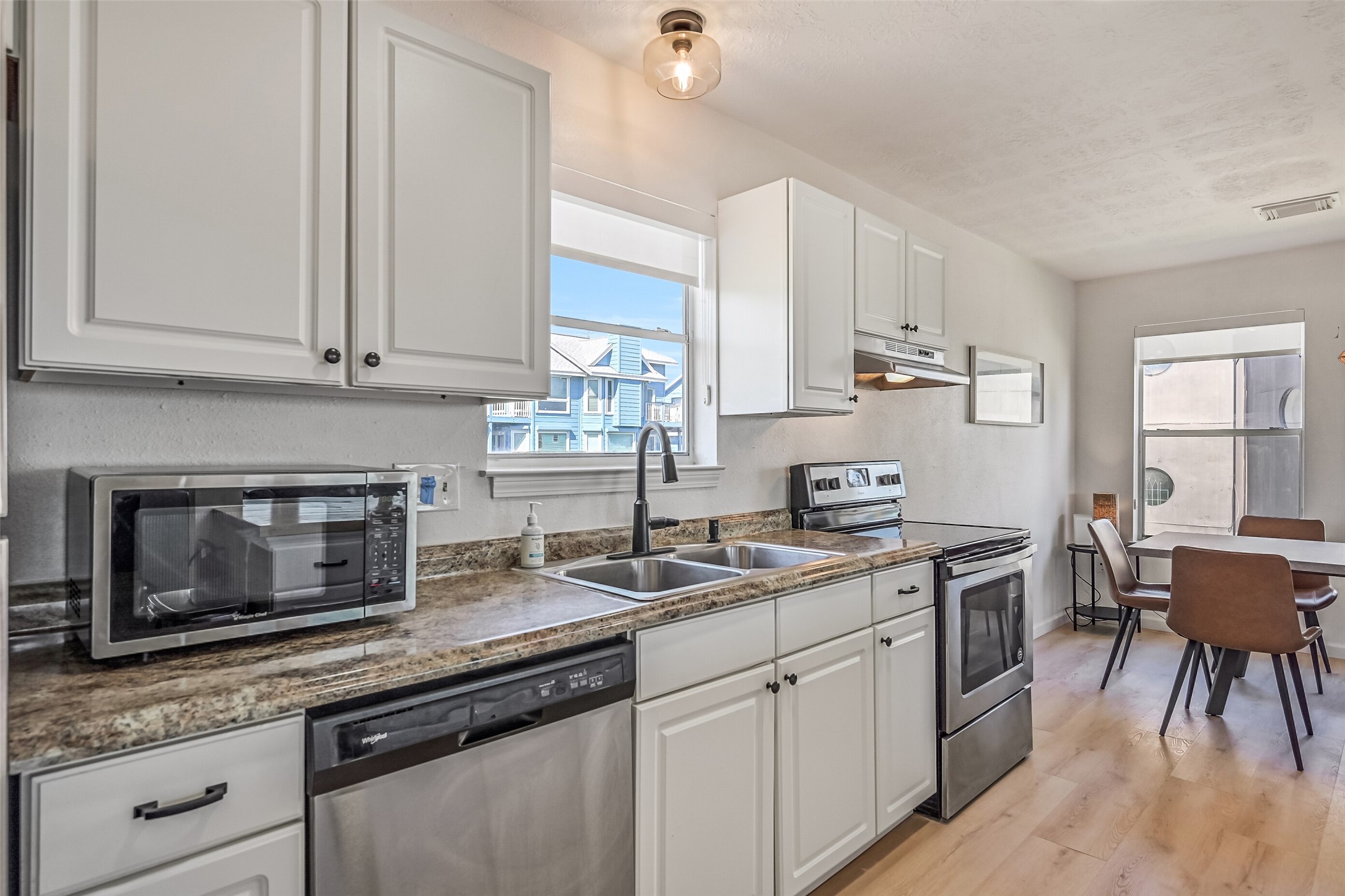 Stainless steel appliances can be found throughout.