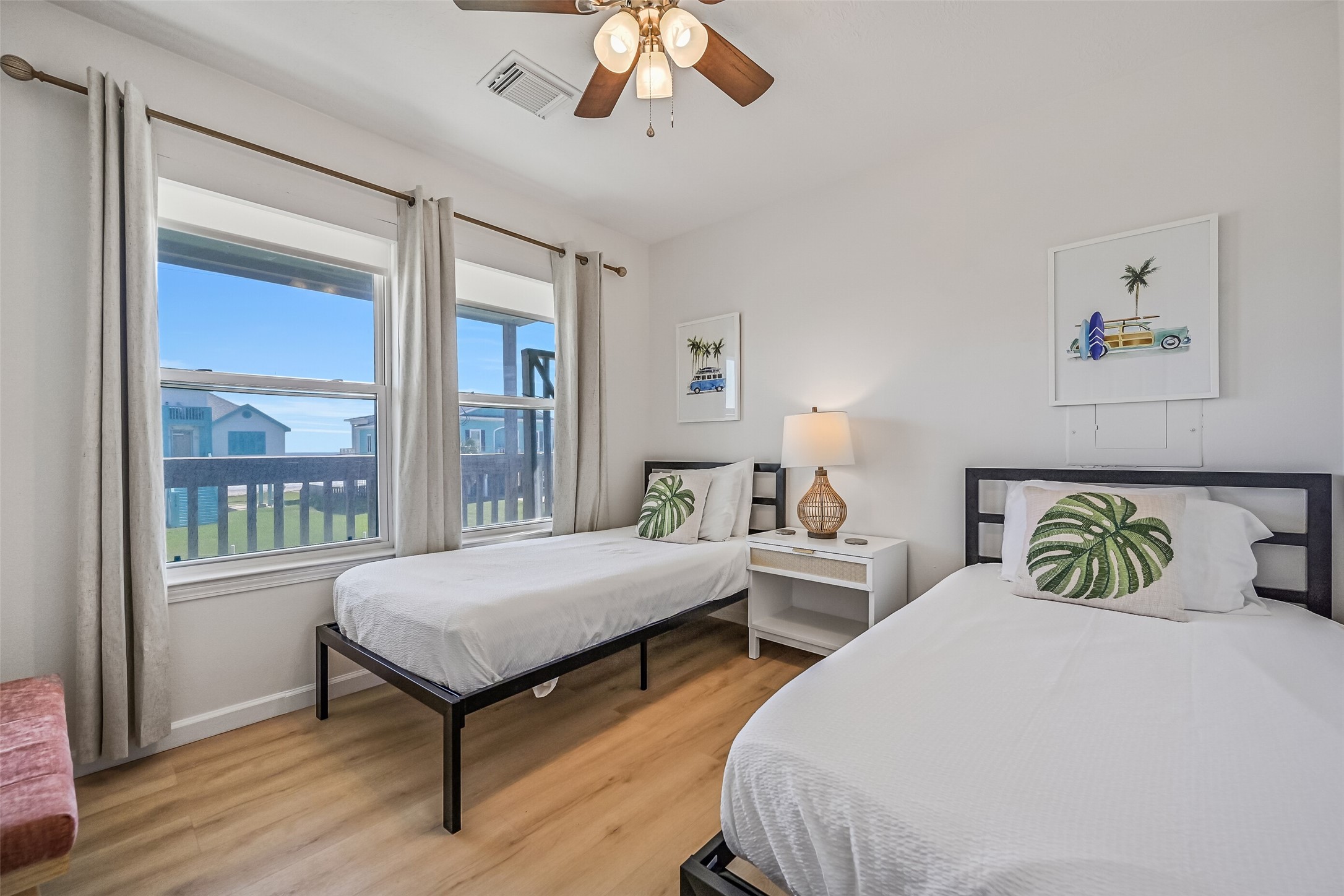 The second guest bedroom currently hosts two twin bedrooms.