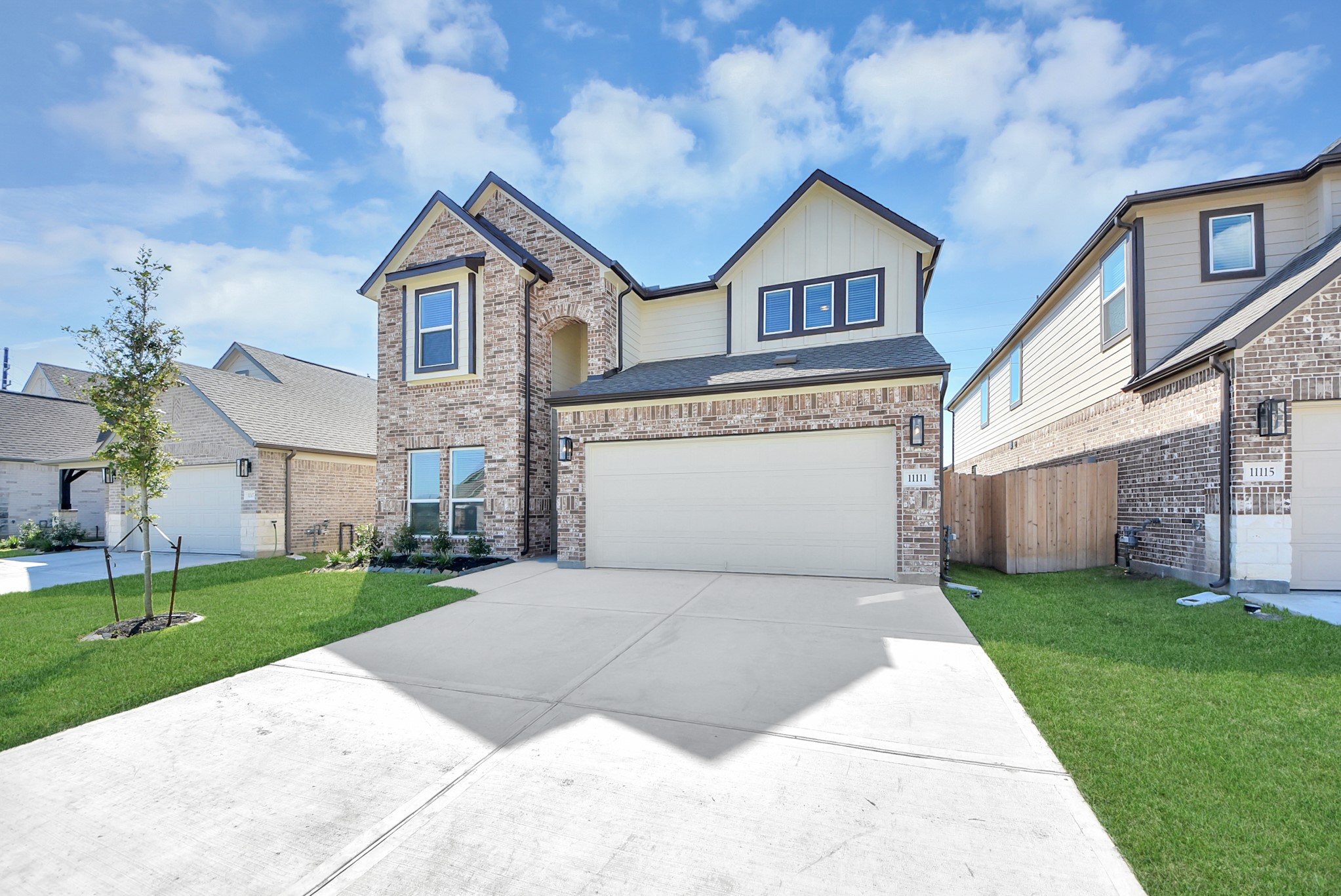 The residence features a practical 2-car garage complemented by a generous driveway, ensuring abundant space for parking needs. The residence features a practical 2-car garage complemented by a generous driveway, ensuring abundant space for parking needs.