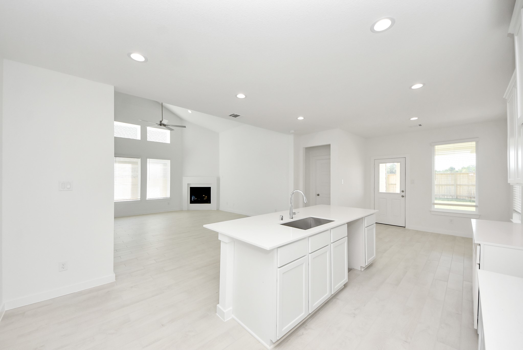 All of this overlooks your expansive family room, creating a perfect space for culinary delights and family gatherings.
