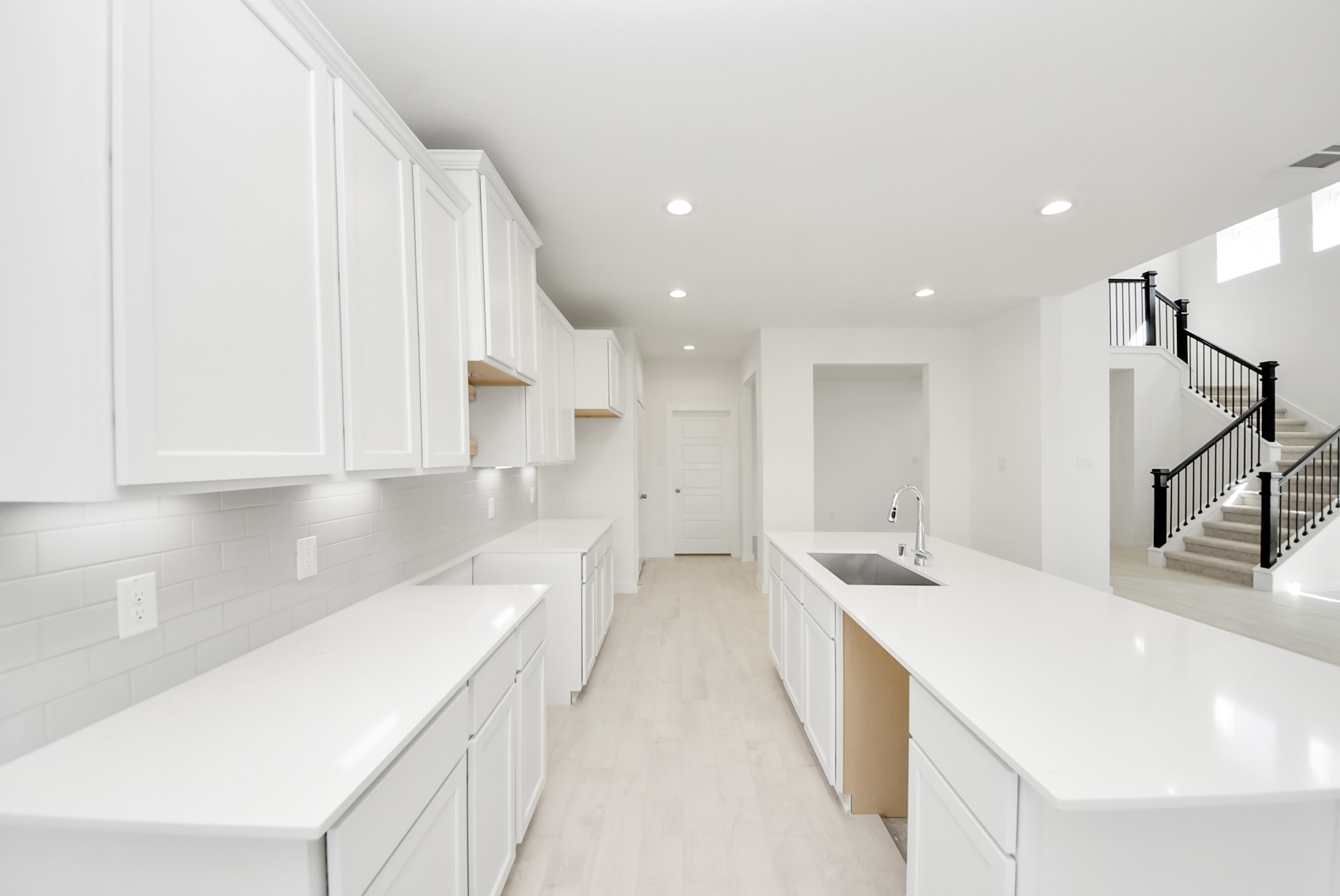 The extended counter area adds both practicality and style, making meal preparation a breeze. Every detail is thoughtfully designed to enhance the kitchen's functionality and aesthetic appeal.