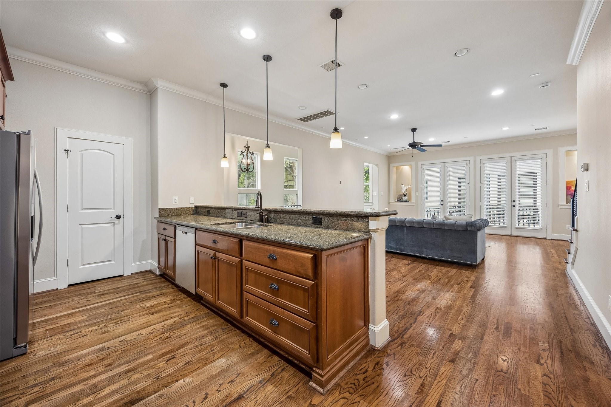 Another view of the kitchen overlooking the living room. This is the perfect set up for gathering with friends and family!