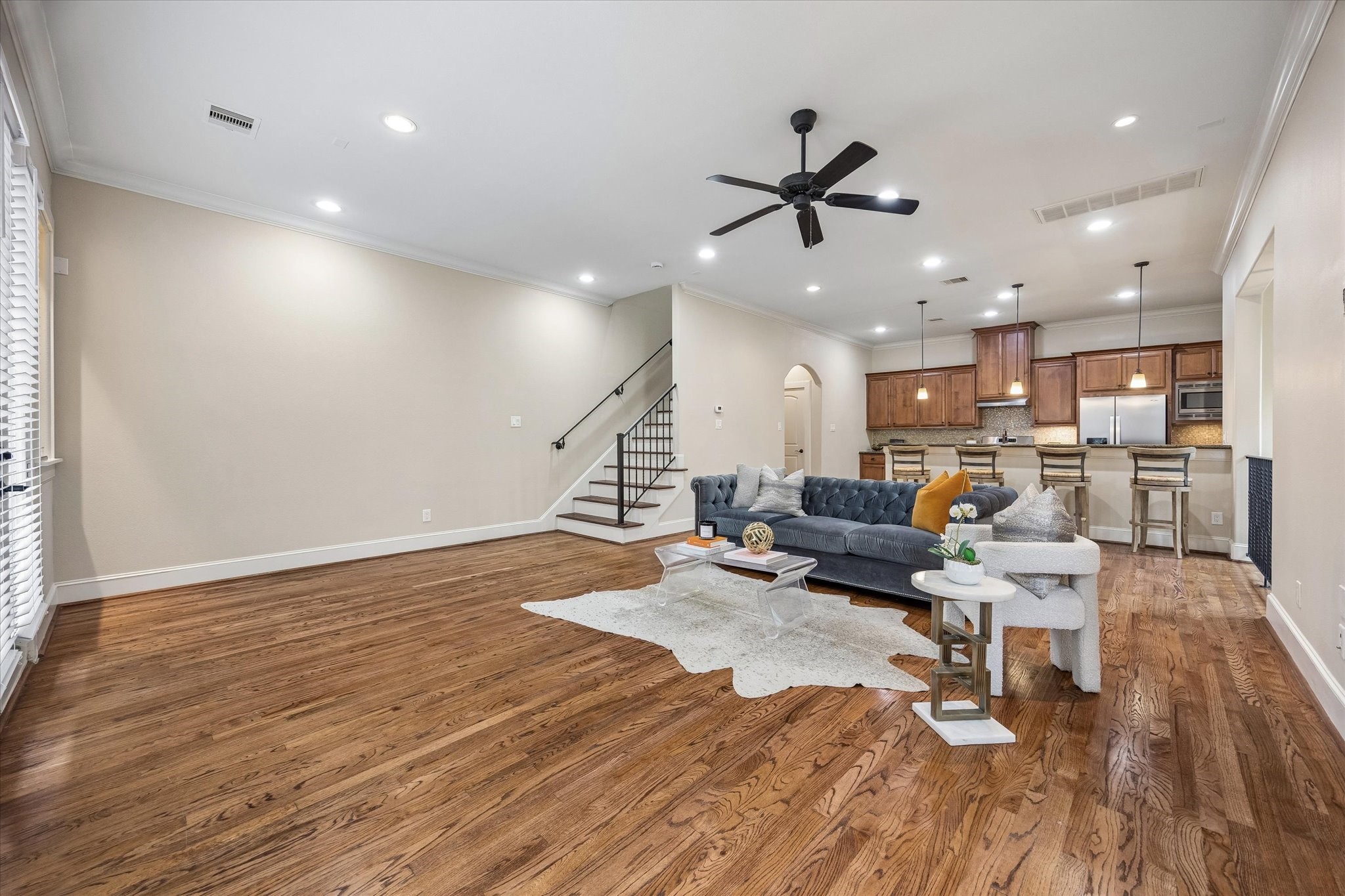 On the second floor, enjoy an open concept living and kitchen space.