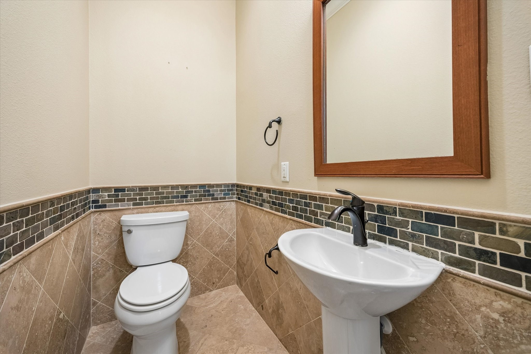 A half bath is conveniently located near the living area for guests.
