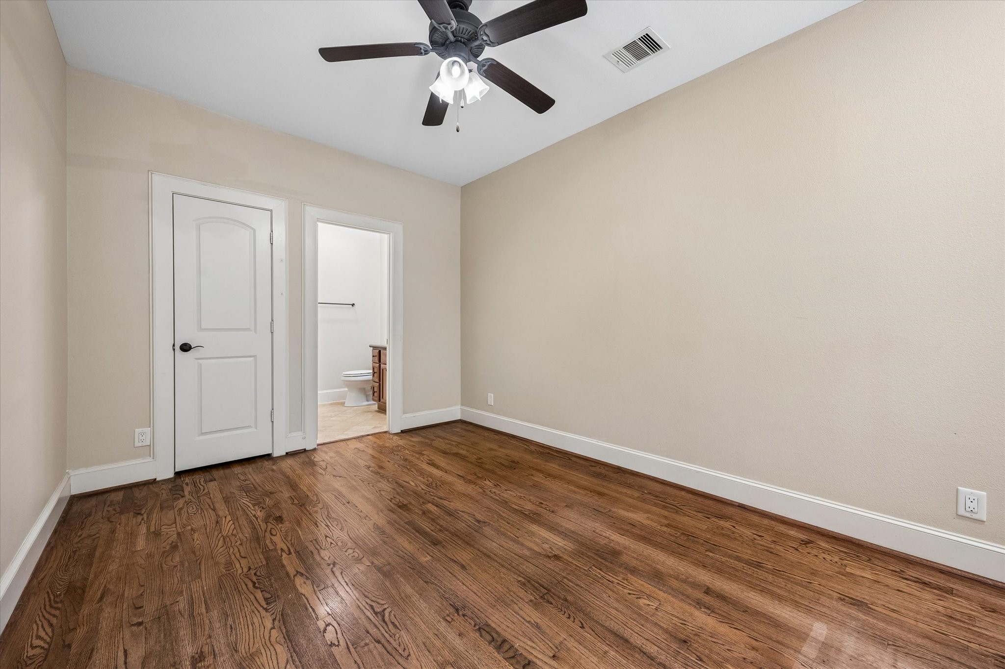The first-floor bedroom features an en suite bathroom and spacious closet. It's perfect for a home office! The first-floor bedroom features an en suite bathroom and spacious closet. It's perfect for a home office!