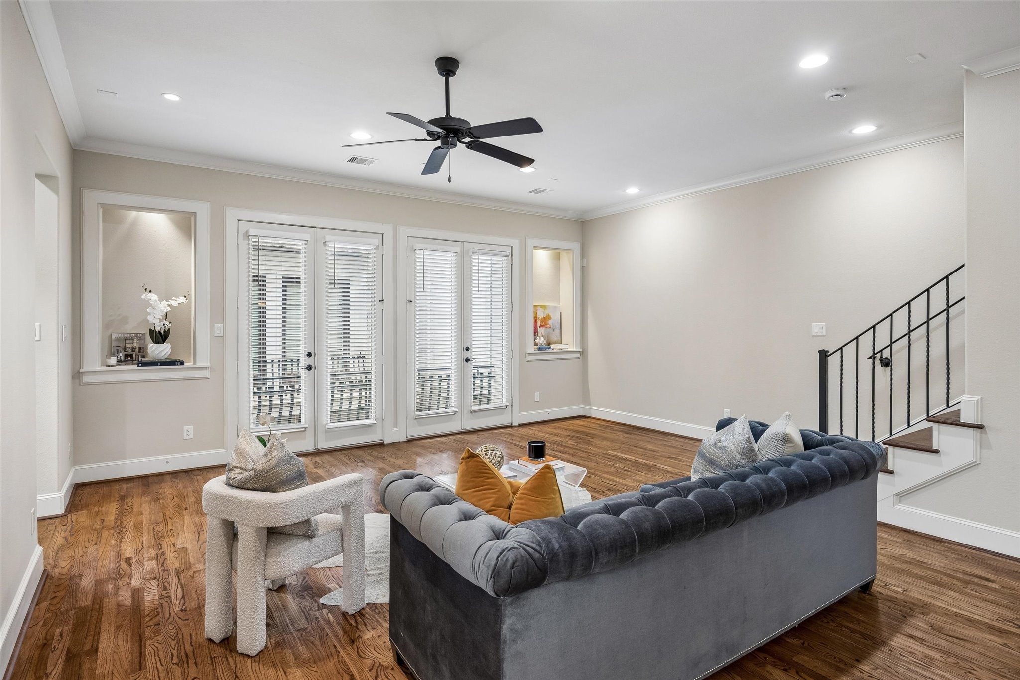French doors open to the balcony and provide an abundance of natural light.