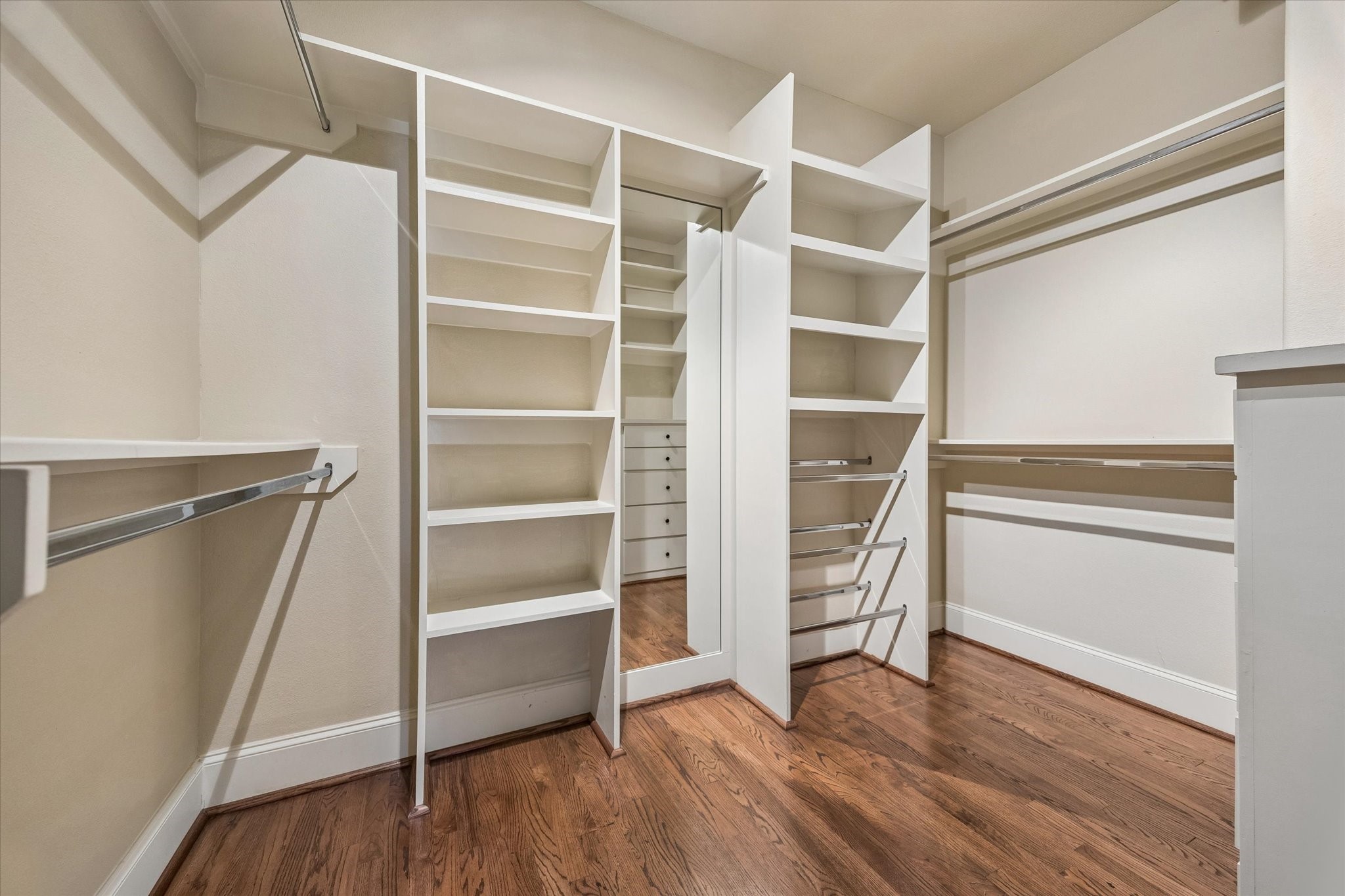 The large primary closet has a great amount of storage in addition to a linen closet in the bathroom.